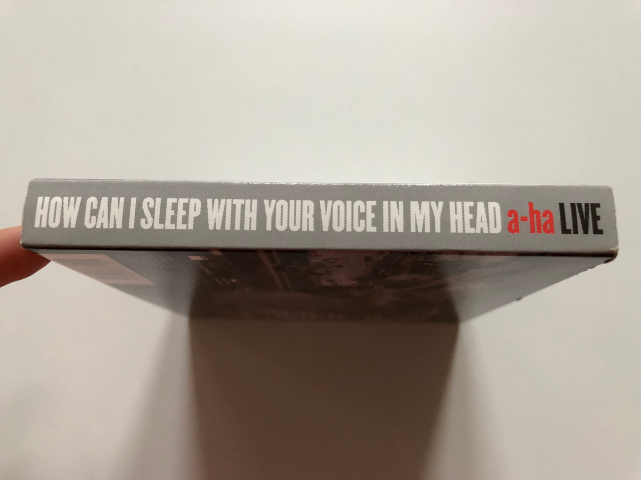 https://cdn10.bigcommerce.com/s-62bdpkt7pb/products/0/images/198798/How_Can_I_Sleep_With_Your_Voice_In_My_Head_-_a-ha_-_LIVE_Feat._The_Sun_Always_Shines_On_TV_Summer_Moved_On_Forever_Not_Yours_Take_On_Me_Incl._Poster_WEA_Records_2x_Audio_CD_2003_50504_8__37049.1636442161.1280.1280.JPG?c=2&_gl=1*tsyls6*_ga*MjA2NTIxMjE2MC4xNTkwNTEyNTMy*_ga_WS2VZYPC6G*MTYzNjQ0MDUyNy4xNjEuMS4xNjM2NDQxNzAzLjI3