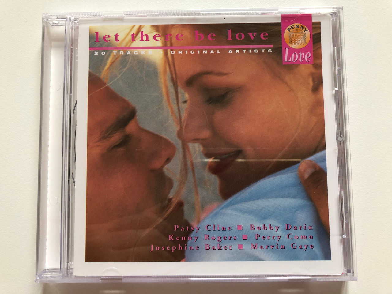 https://cdn10.bigcommerce.com/s-62bdpkt7pb/products/0/images/198959/Let_There_Be_Love_-_20_Tracks_Original_Artists_Patsy_Cline_Bobby_Darin_Kenny_Rogers_Perry_Como_Josephine_Baker_Marvin_Gaye_Newsound_Audio_CD_1996_PYCD_151_1__57760.1636539843.1280.1280.JPG?c=2&_gl=1*b80k1s*_ga*MjA2NTIxMjE2MC4xNTkwNTEyNTMy*_ga_WS2VZYPC6G*MTYzNjUzMTE1NC4xNjMuMS4xNjM2NTM5Njc1LjU3