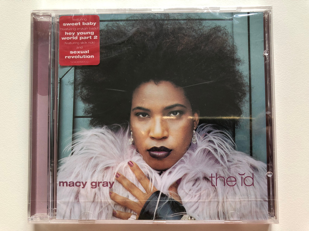 https://cdn10.bigcommerce.com/s-62bdpkt7pb/products/0/images/199091/Macy_Gray_The_Id_Featuring_Sweet_Baby_featuring_erykah_badu_Hey_Young_World_Part_2_featuring_slick_rick_and_Sexual_Revolution_Epic_Audio_CD_2001_EPC_504089_2_1__02511.1636645204.1280.1280.JPG?c=2&_gl=1*1g387ni*_ga*MjA2NTIxMjE2MC4xNTkwNTEyNTMy*_ga_WS2VZYPC6G*MTYzNjY0NDQ4OS4xNjYuMS4xNjM2NjQ0ODY5LjM2