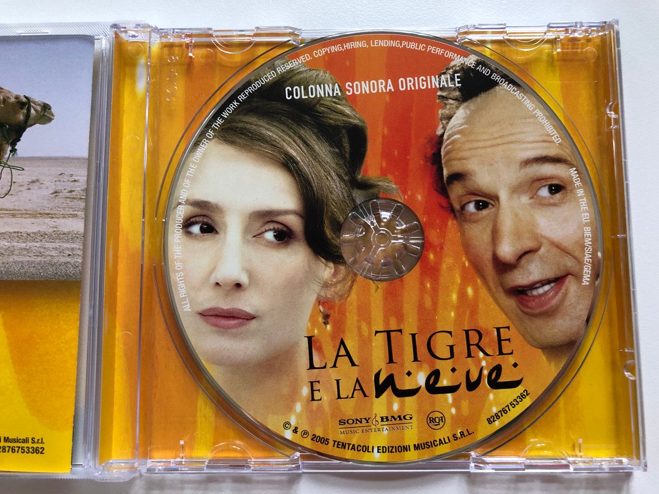 https://cdn10.bigcommerce.com/s-62bdpkt7pb/products/0/images/199231/La_Tigre_E_La_Neve_Colonna_Sonora_Originale_Regia_di_Roberto_Benigni_Musiche_di_Nicola_Piovani_Sony_BMG_Music_Entertainment_Audio_CD_2005_83876753362_3__44996.1636714852.1280.1280.JPG?c=2&_gl=1*1mnedgm*_ga*MjA2NTIxMjE2MC4xNTkwNTEyNTMy*_ga_WS2VZYPC6G*MTYzNjcxMDM2OC4xNjguMS4xNjM2NzE0NjY3LjU4