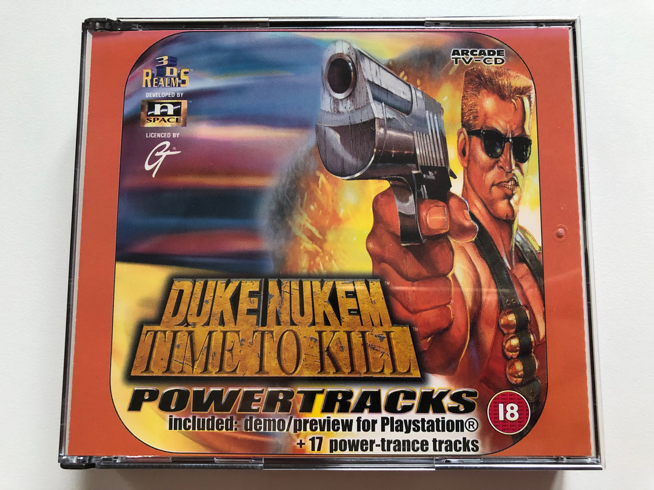 https://cdn10.bigcommerce.com/s-62bdpkt7pb/products/0/images/199236/Duke_Nukem_-_Time_To_Kill_-_Powertracks_Includes_demopreiview_for_Playstation_17_power-trance_tracks_Arcade_Audio_CD_Playstation_CD_1998_2107000_1__55168.1636715402.1280.1280.JPG?c=2&_gl=1*1a3yq9e*_ga*MjA2NTIxMjE2MC4xNTkwNTEyNTMy*_ga_WS2VZYPC6G*MTYzNjcxMDM2OC4xNjguMS4xNjM2NzE1MDQ4LjQ5