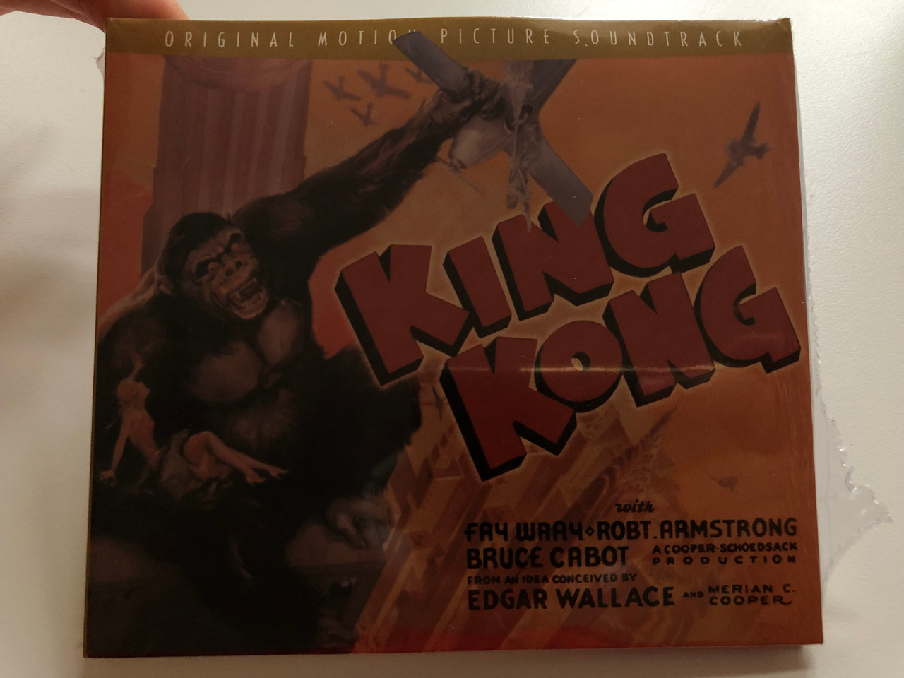 https://cdn10.bigcommerce.com/s-62bdpkt7pb/products/0/images/199305/King_Kong_Original_Motion_Picture_Soundtrack_-_With_Fay_Wray_Robt._Armstrong_Bruce_Cabot_From_An_Idea_Conceived_by_Edgar_Wallace_and_Merian_C._Cooper_Turner_Entertainment_Co._Audio_CD_19_1__11284.1636993586.1280.1280.JPG?c=2&_gl=1*19j9aq2*_ga*MjA2NTIxMjE2MC4xNTkwNTEyNTMy*_ga_WS2VZYPC6G*MTYzNjk5MDk2Ny4xNzAuMS4xNjM2OTkyOTU0LjI.