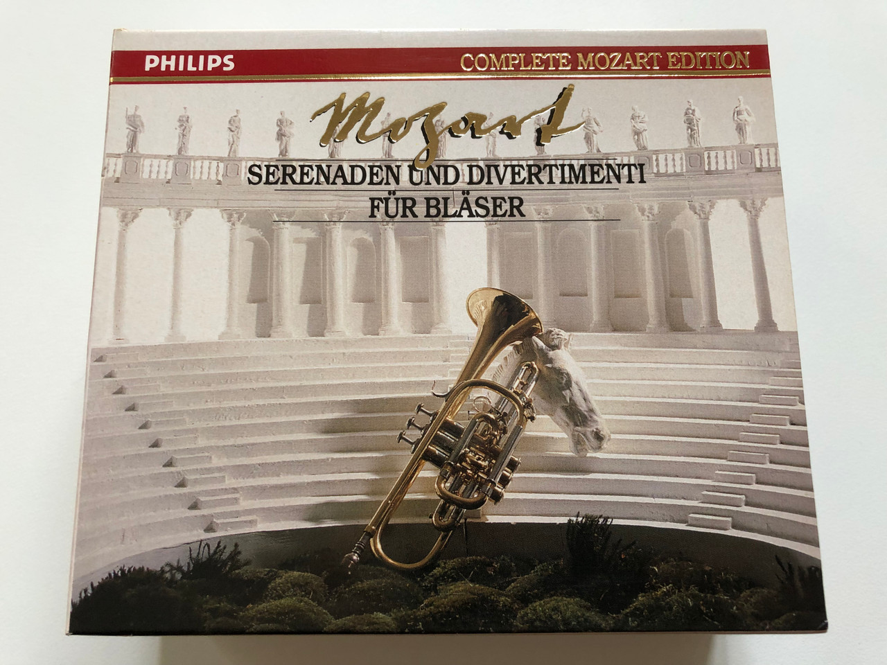 https://cdn10.bigcommerce.com/s-62bdpkt7pb/products/0/images/199376/Mozart_Serenaden_Und_Divertimenti_Fr_Blser_Complete_Mozart_Edition_Philips_Audio_CD_1990_426_879-2_1__74267.1637076583.1280.1280.JPG?c=2&_gl=1*rks84e*_ga*MjA2NTIxMjE2MC4xNTkwNTEyNTMy*_ga_WS2VZYPC6G*MTYzNzA3MzE4OC4xNzIuMS4xNjM3MDc2NDY2LjU4