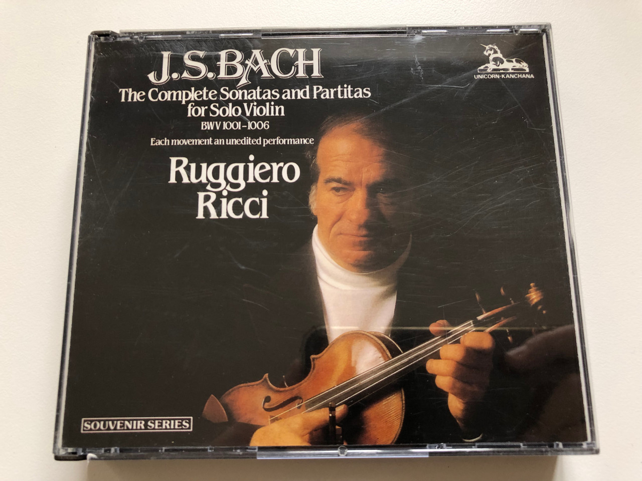 https://cdn10.bigcommerce.com/s-62bdpkt7pb/products/0/images/199405/J._S._Bach_-_The_Complete_Sonatas_and_Partitas_For_Solo_Violin_BWV_1001-1006_-_Ruggiero_Ricci_Unicorn-Kanchana_2x_Audio_CD_1992_UKCD20534_1__51094.1637083215.1280.1280.JPG?c=2&_gl=1*1gbmxbt*_ga*MjA2NTIxMjE2MC4xNTkwNTEyNTMy*_ga_WS2VZYPC6G*MTYzNzA3MzE4OC4xNzIuMS4xNjM3MDgzMDE5LjU1