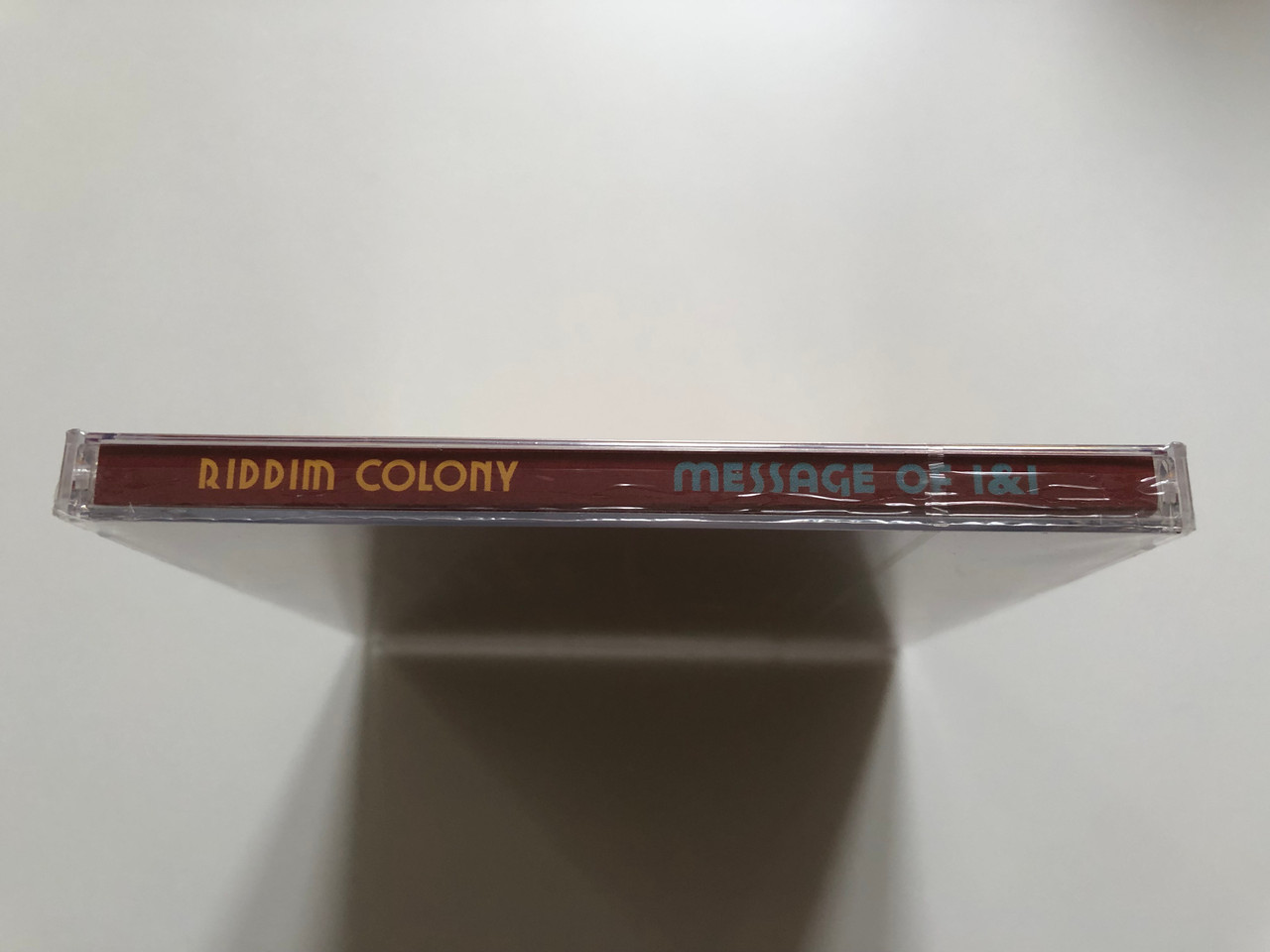 https://cdn10.bigcommerce.com/s-62bdpkt7pb/products/0/images/199502/Riddim_Colony_-_Message_of_I_I_Riddim_Colony_Audio_CD_2008_5999883479049_3__70529.1637168920.1280.1280.JPG?c=2&_gl=1*18m9xnt*_ga*MjA2NTIxMjE2MC4xNTkwNTEyNTMy*_ga_WS2VZYPC6G*MTYzNzE2MTkwOC4xNzMuMS4xNjM3MTY4NjcxLjU4