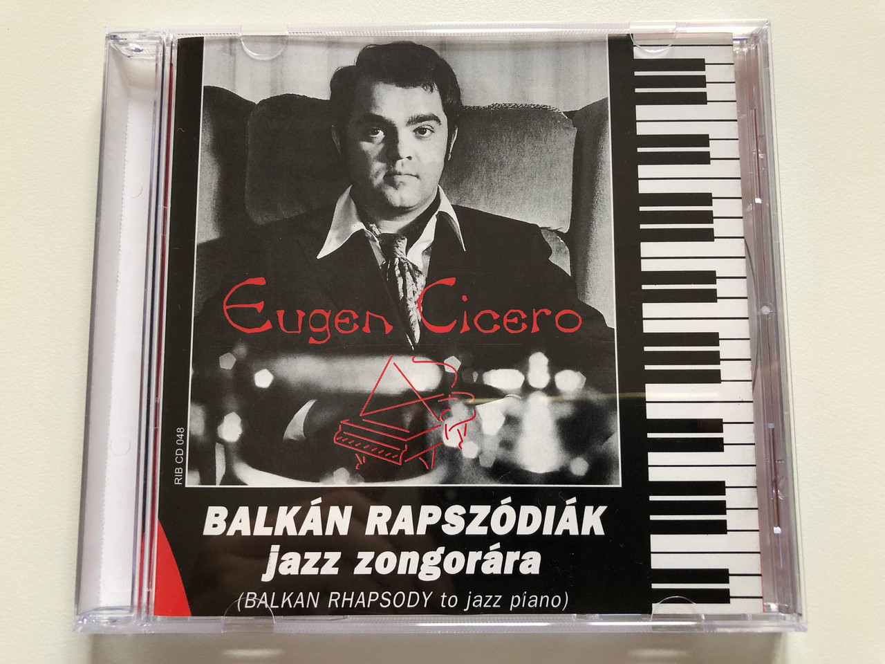 https://cdn10.bigcommerce.com/s-62bdpkt7pb/products/0/images/199570/Eugen_Cicero_-_Balkan_Rapszodiak_Jazz_Zongorara_Balkan_Rhapsody_To_Jazz_Piano_Rock_In_Box_Audio_CD_1998_RIB_CD_048_1__10526.1637244468.1280.1280.JPG?c=2&_gl=1*1qro55h*_ga*MjA2NTIxMjE2MC4xNTkwNTEyNTMy*_ga_WS2VZYPC6G*MTYzNzI0MjU5NS4xNzQuMS4xNjM3MjQzODE0LjUw
