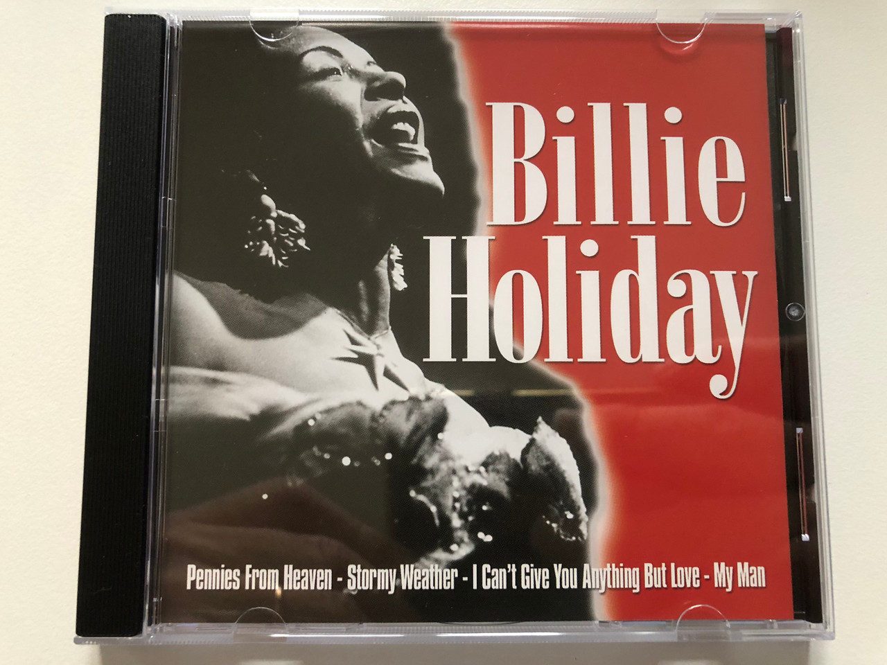 https://cdn10.bigcommerce.com/s-62bdpkt7pb/products/0/images/199581/Billie_Holiday_-_Pennies_From_Heaven_Stormy_Wather_I_Cant_Give_You_Anything_But_Love_My_Man_Forever_Gold_Audio_CD_2001_FG073_1__98044.1637246458.1280.1280.JPG?c=2&_gl=1*r9eld4*_ga*MjA2NTIxMjE2MC4xNTkwNTEyNTMy*_ga_WS2VZYPC6G*MTYzNzI0MjU5NS4xNzQuMS4xNjM3MjQ1NzIzLjYw