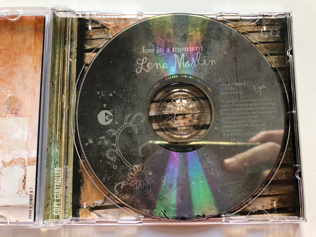 https://cdn10.bigcommerce.com/s-62bdpkt7pb/products/0/images/199646/Lene_Marlin_Lost_In_A_Moment_Virgin_Audio_CD_2005_0946_3_11823_2_7_3__78343.1637258662.1280.1280.JPG?c=2&_gl=1*xxj74j*_ga*MjA2NTIxMjE2MC4xNTkwNTEyNTMy*_ga_WS2VZYPC6G*MTYzNzI0OTk4Ni4xNzUuMS4xNjM3MjU2MTA4LjIw