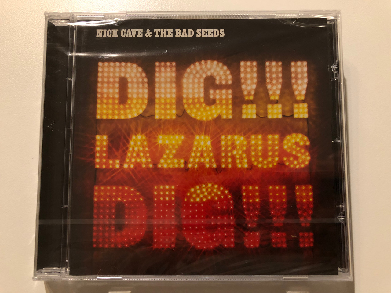 https://cdn10.bigcommerce.com/s-62bdpkt7pb/products/0/images/199733/Nick_Cave_The_Bad_Seeds_Dig_Lazarus_Dig_Mute_Audio_CD_2008_CDSTUMM277_1__47205.1637340094.1280.1280.JPG?c=2&_gl=1*15dr8nm*_ga*MjA2NTIxMjE2MC4xNTkwNTEyNTMy*_ga_WS2VZYPC6G*MTYzNzMzODMyNC4xNzguMS4xNjM3MzM5OTczLjk.