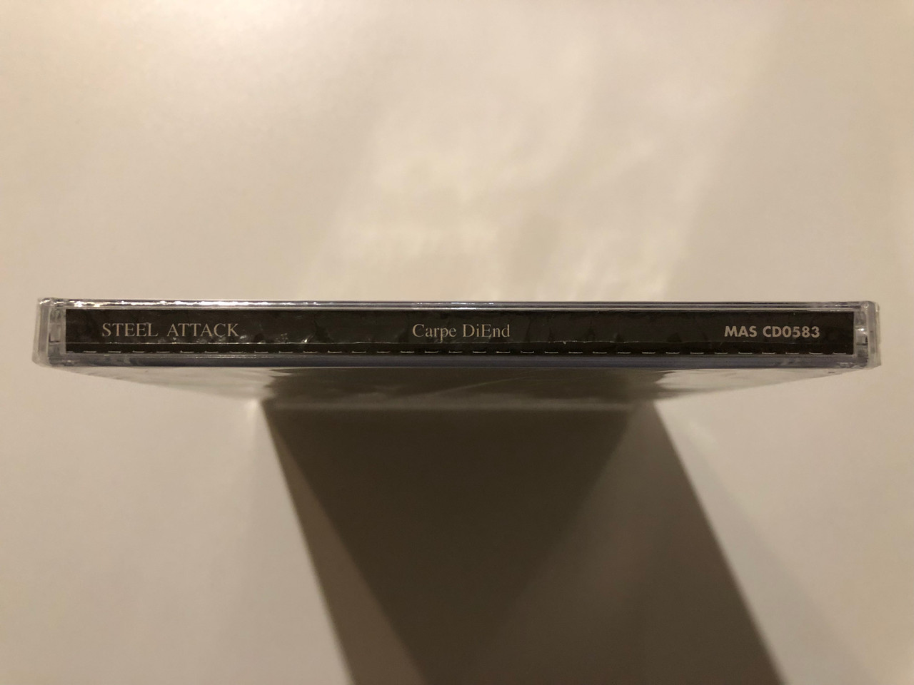 https://cdn10.bigcommerce.com/s-62bdpkt7pb/products/0/images/199735/Steel_Attack_Carpe_DiEnd_Mighty_Swedish_heavy_metal_from_one_of_Scandinavias_most_original_power_metal_hands_Produced_by_Mike_Wead_Mercyful_Fate_King_Diamond_Massacre_Records_Audio_3__83063.1637340499.1280.1280.JPG?c=2&_gl=1*1u86lzl*_ga*MjA2NTIxMjE2MC4xNTkwNTEyNTMy*_ga_WS2VZYPC6G*MTYzNzMzODMyNC4xNzguMS4xNjM3MzQwMzA3LjYw