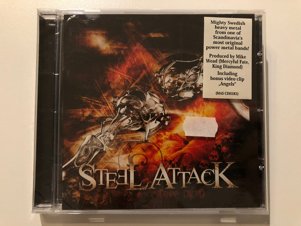 https://cdn10.bigcommerce.com/s-62bdpkt7pb/products/0/images/199736/Steel_Attack_Carpe_DiEnd_Mighty_Swedish_heavy_metal_from_one_of_Scandinavias_most_original_power_metal_hands_Produced_by_Mike_Wead_Mercyful_Fate_King_Diamond_Massacre_Records_Audio_C_1__21609.1637340501.1280.1280.JPG?c=2&_gl=1*1u86lzl*_ga*MjA2NTIxMjE2MC4xNTkwNTEyNTMy*_ga_WS2VZYPC6G*MTYzNzMzODMyNC4xNzguMS4xNjM3MzQwMzA3LjYw