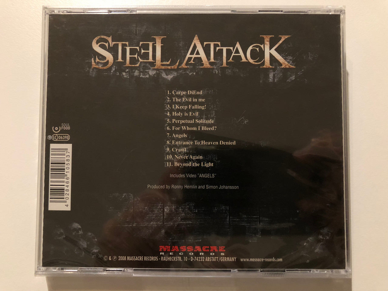 https://cdn10.bigcommerce.com/s-62bdpkt7pb/products/0/images/199737/Steel_Attack_Carpe_DiEnd_Mighty_Swedish_heavy_metal_from_one_of_Scandinavias_most_original_power_metal_hands_Produced_by_Mike_Wead_Mercyful_Fate_King_Diamond_Massacre_Records_Audio__98593.1637340502.1280.1280.JPG?c=2&_gl=1*1u86lzl*_ga*MjA2NTIxMjE2MC4xNTkwNTEyNTMy*_ga_WS2VZYPC6G*MTYzNzMzODMyNC4xNzguMS4xNjM3MzQwMzA3LjYw
