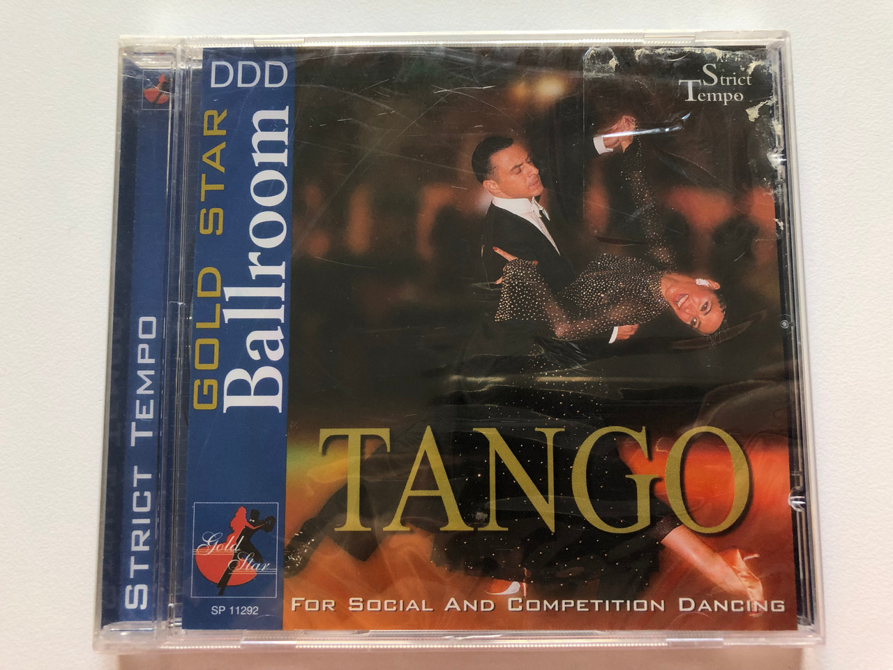 https://cdn10.bigcommerce.com/s-62bdpkt7pb/products/0/images/200077/Gold_Star_Ballroom_-_Tango_-_For_Social_And_Competition_Dancing_Strict_Tempo_Audio_CD_2003_5021364112920_1__06856.1637652218.1280.1280.JPG?c=2&_gl=1*fb3c6w*_ga*MjA2NTIxMjE2MC4xNTkwNTEyNTMy*_ga_WS2VZYPC6G*MTYzNzY0ODI3NC4xODAuMS4xNjM3NjUxOTE5LjYw