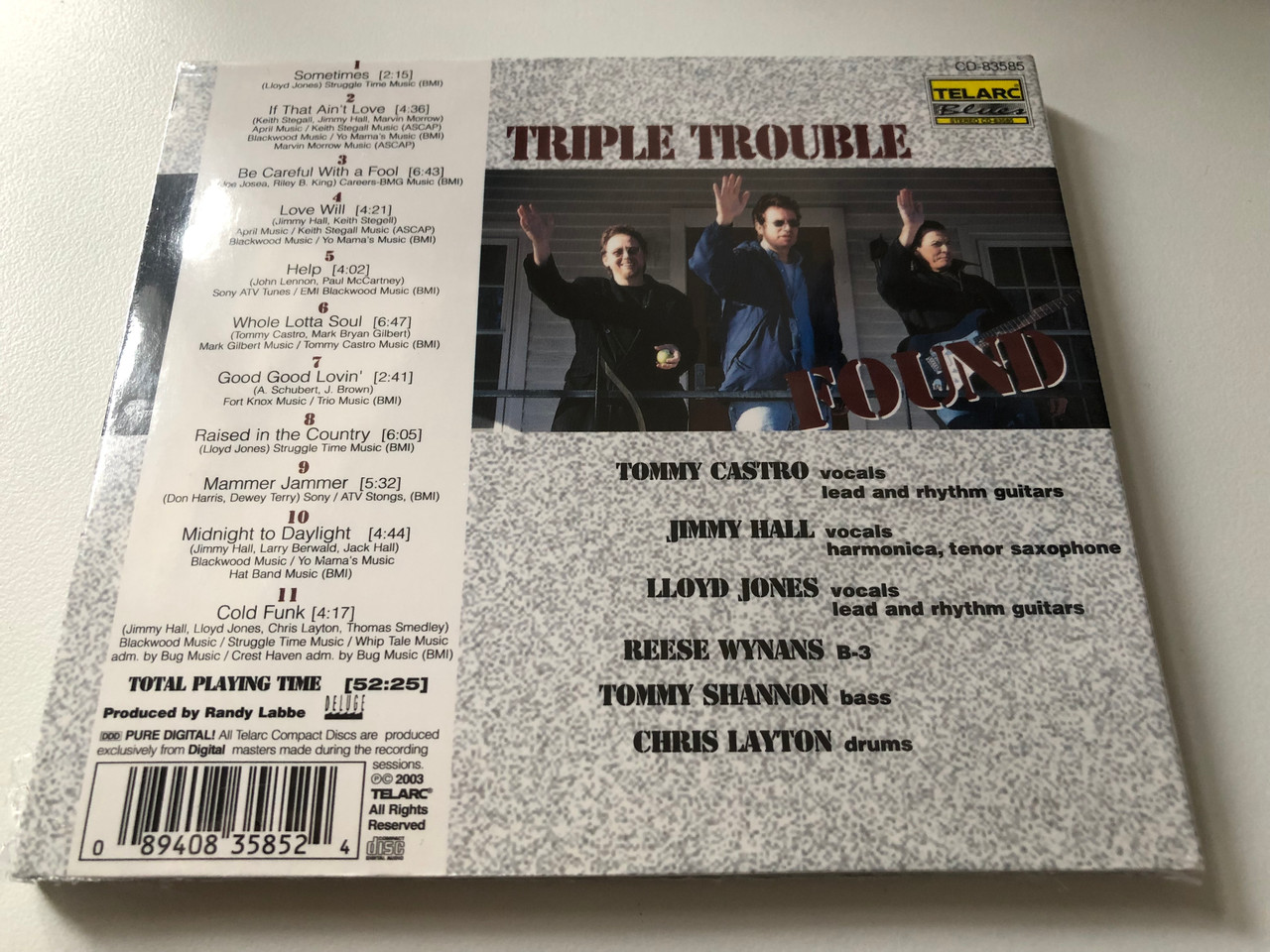 https://cdn10.bigcommerce.com/s-62bdpkt7pb/products/0/images/200307/Triple_Trouble_-_Tommy_Castro_Jimmy_Hall_Lloyd_Jones_Telarc_Audio_CD_2003_CD-83585_2__35814.1637745458.1280.1280.JPG?c=2&_gl=1*xv9brc*_ga*MjA2NTIxMjE2MC4xNTkwNTEyNTMy*_ga_WS2VZYPC6G*MTYzNzczNjc0MC4xODQuMS4xNjM3NzQ1MTM2LjQw