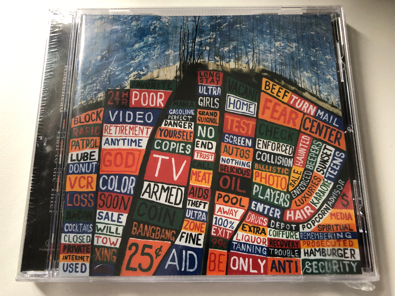 https://cdn10.bigcommerce.com/s-62bdpkt7pb/products/0/images/200320/Radiohead_Hail_To_The_Thief_EMI_Records_Audio_CD_2003_724358454321_1__13467.1637751980.1280.1280.JPG?c=2&_gl=1*1sauuxm*_ga*MjA2NTIxMjE2MC4xNTkwNTEyNTMy*_ga_WS2VZYPC6G*MTYzNzc1MTUzMi4xODUuMS4xNjM3NzUxODk0LjI4