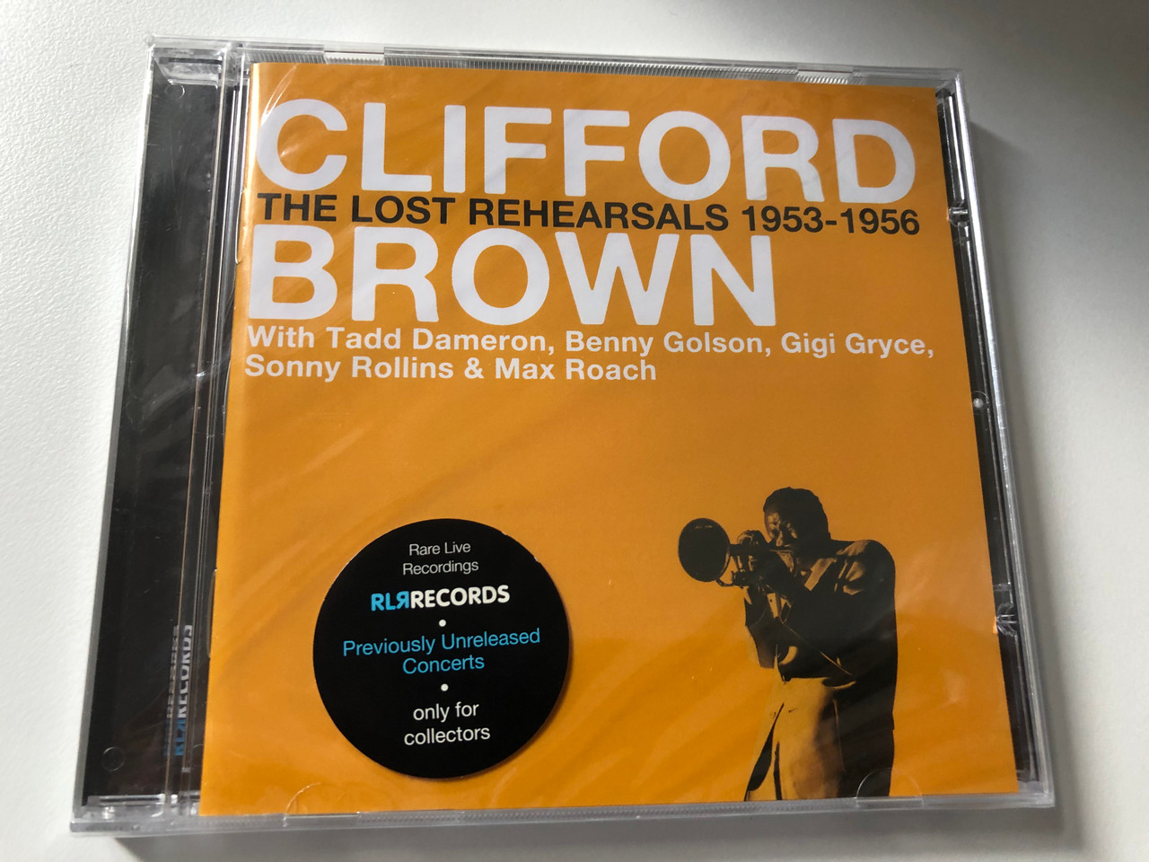 https://cdn10.bigcommerce.com/s-62bdpkt7pb/products/0/images/200432/Clifford_Brown_The_Lost_Rehearsals_1953-1956_-_With_Tedd_Dameron_Benny_Golson_Gigi_Gryce_Sonny_Rollins_Max_Roach_RLR_Records_Audio_CD_2009_RLR_88651_1__14179.1637843427.1280.1280.JPG?c=2&_gl=1*1m94vub*_ga*MjA2NTIxMjE2MC4xNTkwNTEyNTMy*_ga_WS2VZYPC6G*MTYzNzgzODk5Mi4xODcuMS4xNjM3ODQyODQ1LjMx