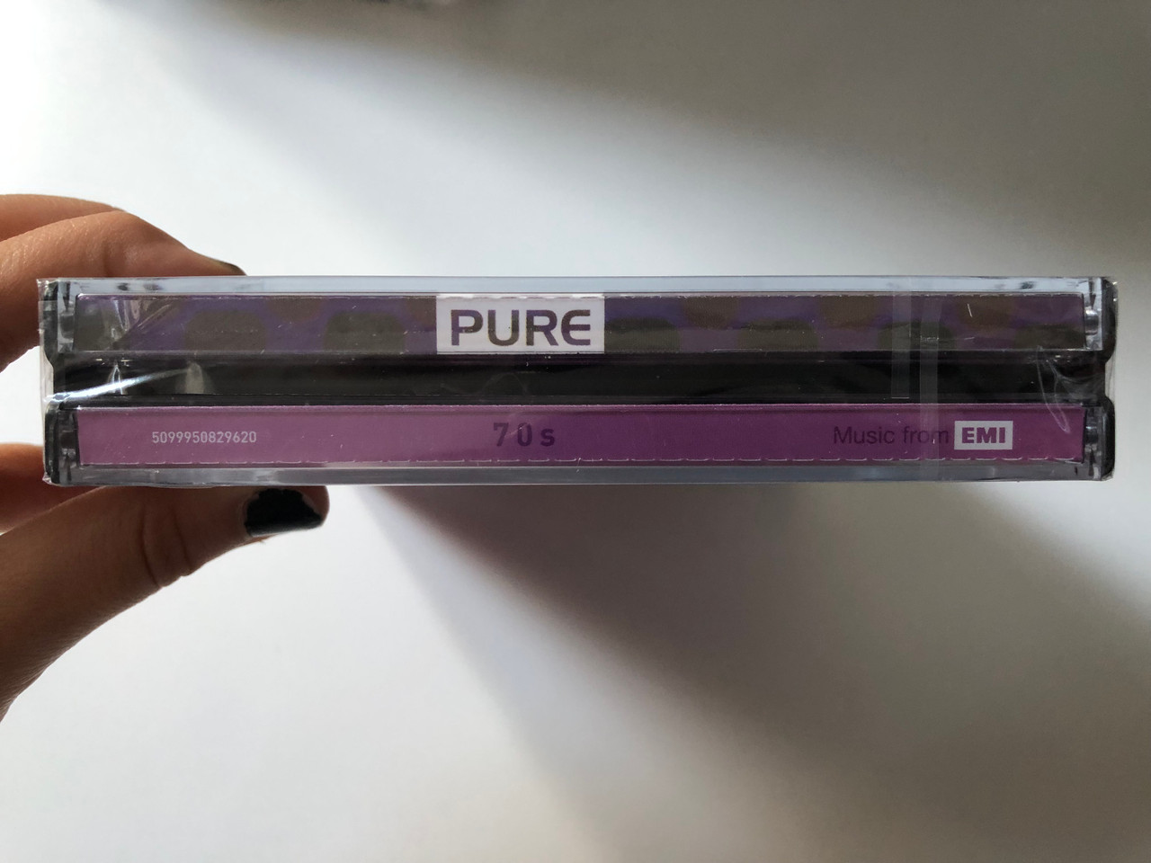 https://cdn10.bigcommerce.com/s-62bdpkt7pb/products/0/images/200476/Pure_70s_-_57_Original_Hits_By_The_Original_Artists_EMI_3x_Audio_CD_2007_5099950829620_3__90923.1637859128.1280.1280.JPG?c=2&_gl=1*1it5c64*_ga*MjA2NTIxMjE2MC4xNTkwNTEyNTMy*_ga_WS2VZYPC6G*MTYzNzg1MjczMi4xODkuMS4xNjM3ODU5MTUxLjYw