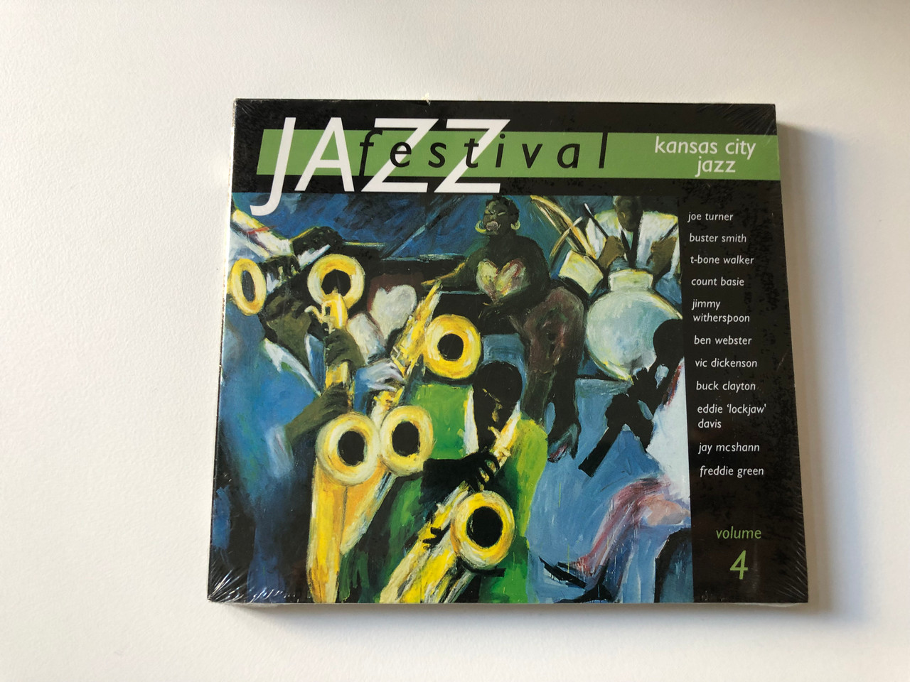 https://cdn10.bigcommerce.com/s-62bdpkt7pb/products/0/images/200782/Jazz_Festival_-_Volume_4_-_kansas_city_jazz_Joe_Turner_Buster_Smith_T-bone_Walker_Count_Basie_Jimmy_Witherspoon_Ben_Webster_Vic_Dickenson_Buck_Clayton_Warner_Strategic_Marketing_Audi_1__96943.1638281380.1280.1280.JPG?c=2&_gl=1*ufkn7i*_ga*MjA2NTIxMjE2MC4xNTkwNTEyNTMy*_ga_WS2VZYPC6G*MTYzODI3OTIyNy4xOTYuMS4xNjM4MjgxMDM4LjQz