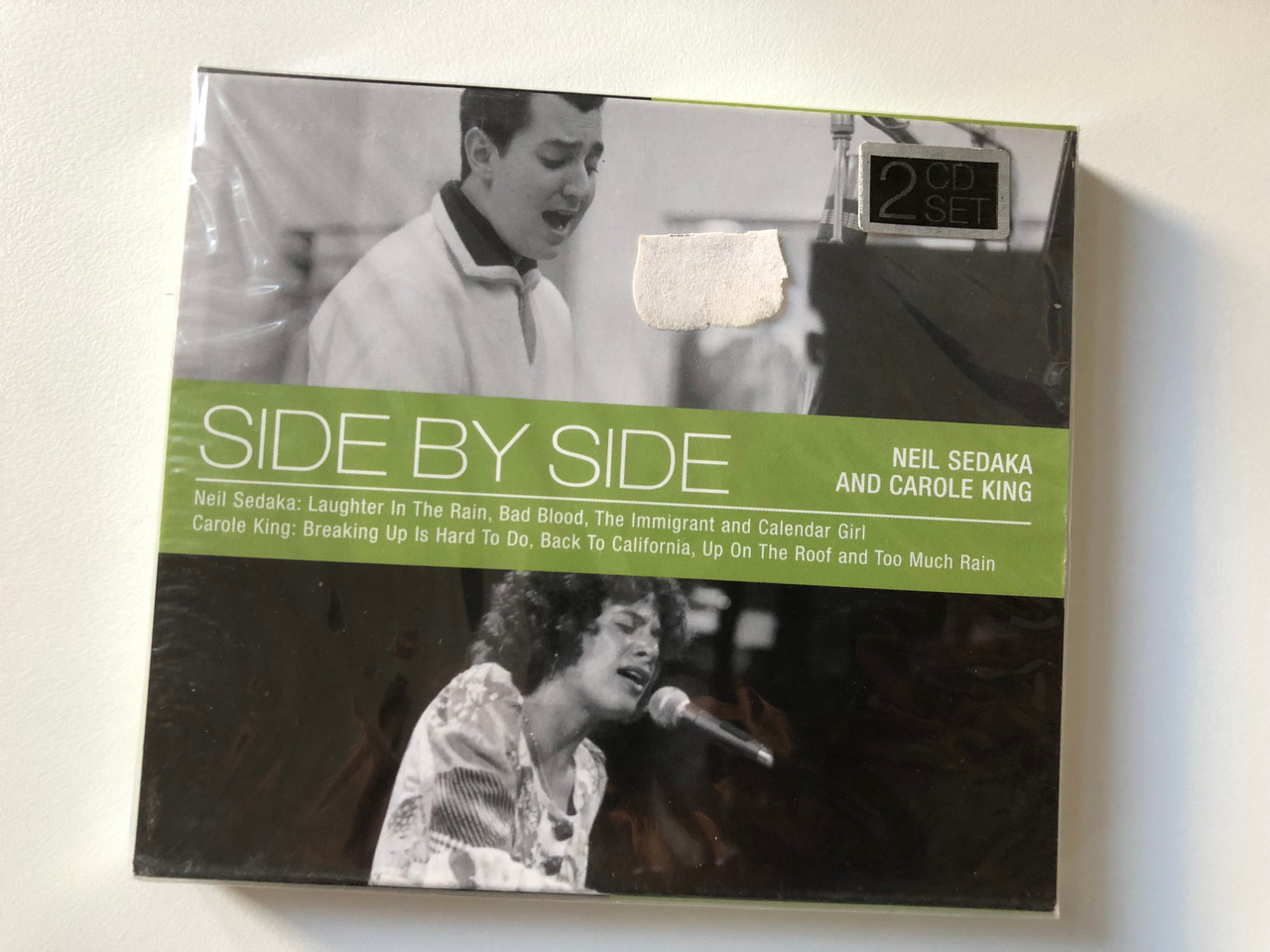 https://cdn10.bigcommerce.com/s-62bdpkt7pb/products/0/images/200820/Side_By_Side_-_Neil_Sedaka_And_Carole_King_Neil_Sedaka_Laughter_In_The_Rain_Bad_Blood_The_Immigrant_and_Calendar_Girl_Carole_King_Breaking_Up_Is_Hard_To_Do_Back_To_California_Up_On_The_1__41465.1638343526.1280.1280.JPG?c=2&_gl=1*duk57d*_ga*MjA2NTIxMjE2MC4xNTkwNTEyNTMy*_ga_WS2VZYPC6G*MTYzODM0MTY0MS4xOTcuMS4xNjM4MzQyOTcwLjM5