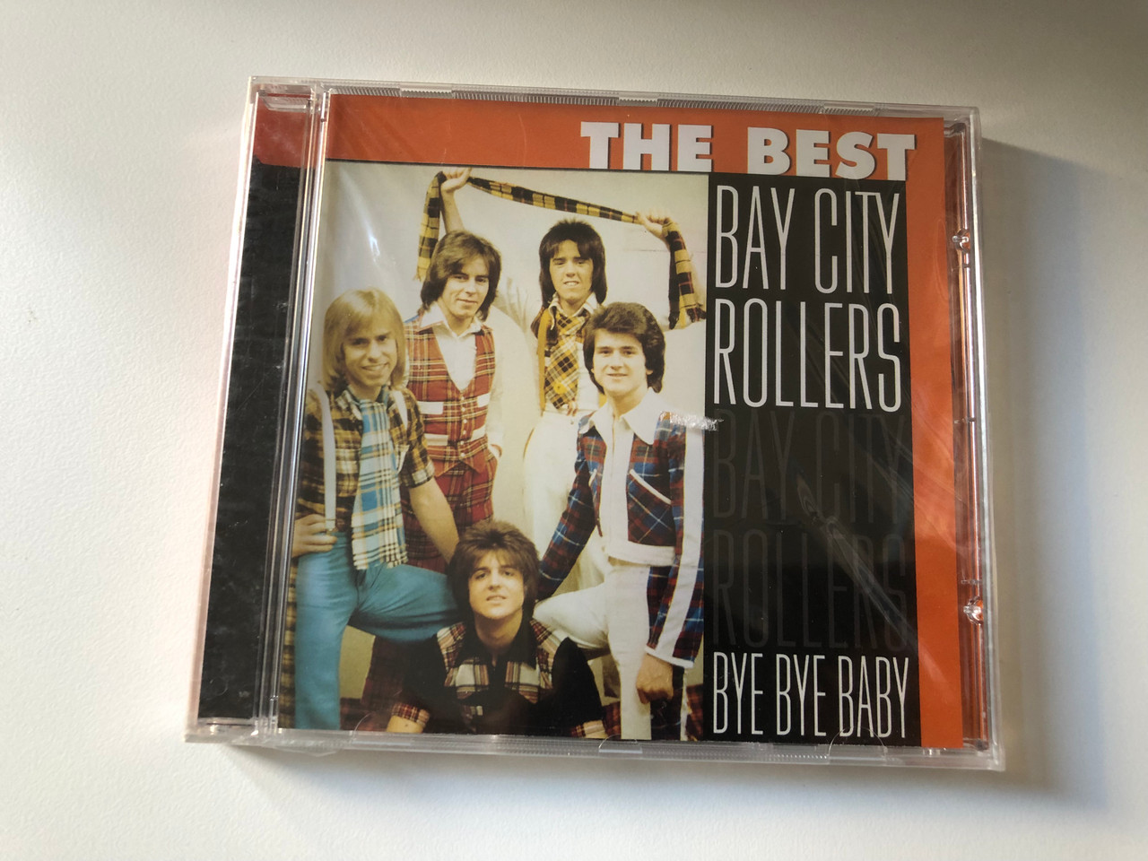 https://cdn10.bigcommerce.com/s-62bdpkt7pb/products/0/images/200839/The_Best_-_Bay_City_Rollers_-_Bye_Bye_Baby_ACD_Audio_CD_CD_154_1__32091.1638347416.1280.1280.JPG?c=2&_gl=1*1o0lfvd*_ga*MjA2NTIxMjE2MC4xNTkwNTEyNTMy*_ga_WS2VZYPC6G*MTYzODM0MTY0MS4xOTcuMS4xNjM4MzQ3MjI5LjM4