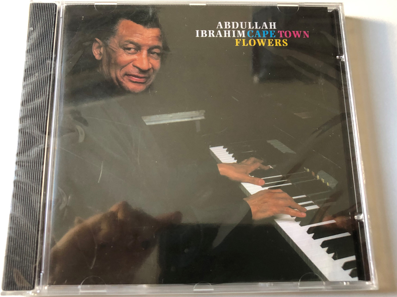 https://cdn10.bigcommerce.com/s-62bdpkt7pb/products/0/images/200923/Abdullah_Ibrahim_Cape_Town_Flowers_Tiptoe_Audio_CD_1997_TIP-888_826_2_1__83891.1638433986.1280.1280.JPG?c=2&_gl=1*6l0bx0*_ga*MjA2NTIxMjE2MC4xNTkwNTEyNTMy*_ga_WS2VZYPC6G*MTYzODQyOTI1OC4xOTguMS4xNjM4NDMzODcxLjQx