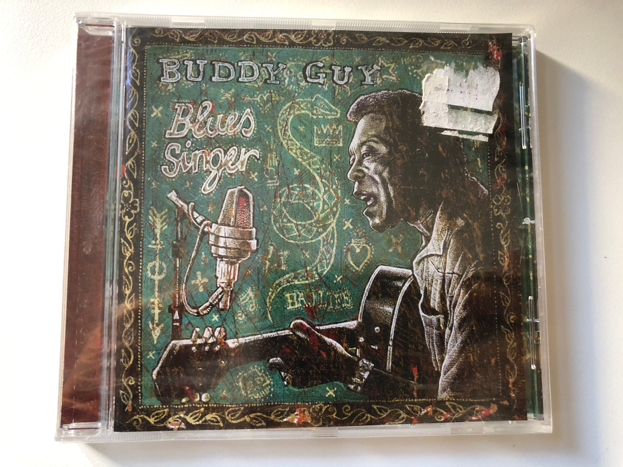 https://cdn10.bigcommerce.com/s-62bdpkt7pb/products/0/images/200969/Buddy_Guy_Blues_Singer_Silvertone_Records_Audio_CD_2003_82876534682_1__24075.1638448693.1280.1280.JPG?c=2&_gl=1*bn7tjc*_ga*MjA2NTIxMjE2MC4xNTkwNTEyNTMy*_ga_WS2VZYPC6G*MTYzODQ0MDM5Mi4xOTkuMS4xNjM4NDQ4MzQ5LjI1
