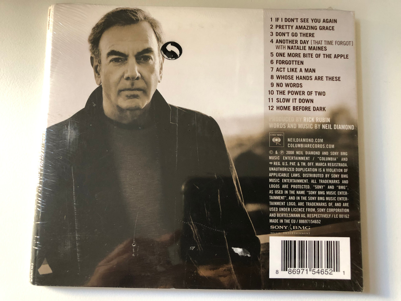 https://cdn10.bigcommerce.com/s-62bdpkt7pb/products/0/images/200991/Neil_Diamond_Home_Before_Dark_Features_Twelve_All_New_Original_Songs_-_Pretty_Amazing_Grace_If_I_Dont_See_You_Again_Another_Day_That_Time_Forgot_with_Natalie_Maines_Album_Produced__82641.1638514660.1280.1280.JPG?c=2&_gl=1*2u7c73*_ga*MjA2NTIxMjE2MC4xNTkwNTEyNTMy*_ga_WS2VZYPC6G*MTYzODUxNDM5NC4yMDAuMC4xNjM4NTE0Mzk0LjYw