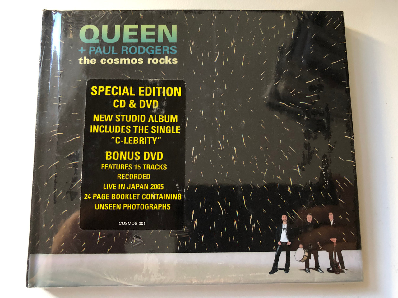https://cdn10.bigcommerce.com/s-62bdpkt7pb/products/0/images/200994/Queen_Paul_Rodgers_The_Cosmos_Rocks_Special_Edition_CD_DVD_New_Studio_Album_Includes_The_Single_C-lebrity_Bonus_DVD_Features_15_tracks_Recorded_Live_In_Japan_2005_Parlophone_Aud_1__21261.1638515094.1280.1280.JPG?c=2&_gl=1*dnc880*_ga*MjA2NTIxMjE2MC4xNTkwNTEyNTMy*_ga_WS2VZYPC6G*MTYzODUxNDM5NC4yMDAuMS4xNjM4NTE0ODM1LjIw