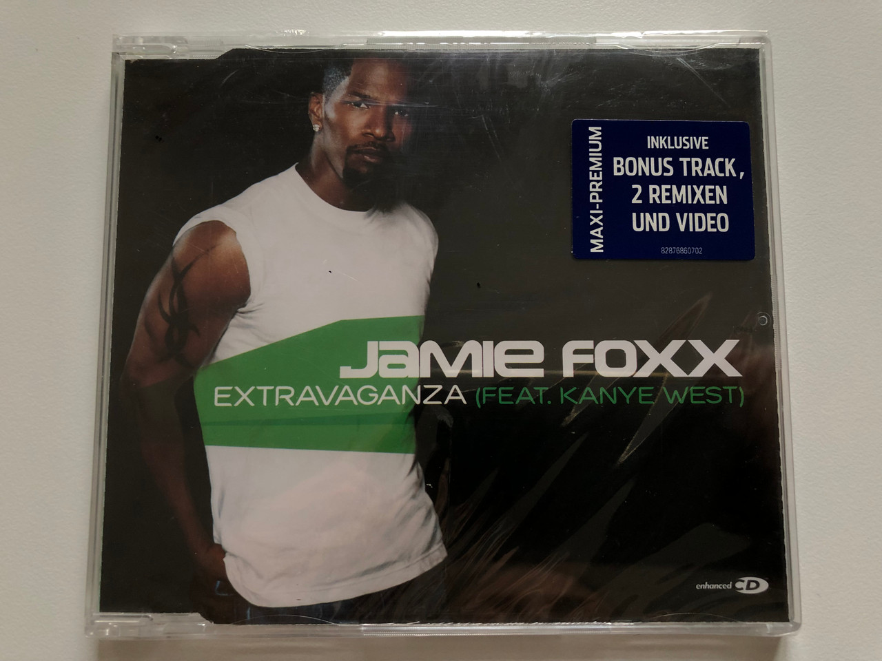 https://cdn10.bigcommerce.com/s-62bdpkt7pb/products/0/images/201180/Jamie_Foxx_-_Extravaganza_-_Feat._Kanye_West_J_Records_Audio_CD_2006_82876-86070-2_1__13369.1638896340.1280.1280.JPG?c=2&_gl=1*k3cpe0*_ga*MjA2NTIxMjE2MC4xNTkwNTEyNTMy*_ga_WS2VZYPC6G*MTYzODg5MjM0OC4yMDUuMS4xNjM4ODk2MTAzLjE3
