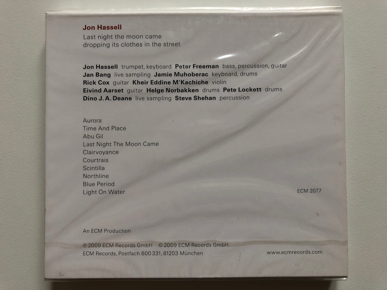 https://cdn10.bigcommerce.com/s-62bdpkt7pb/products/0/images/201247/Jon_Hassell_Last_Night_The_Moon_Came_Dropping_Its_Clothes_In_The_Street_ECM_Records_Audio_CD_2009_ECM_2077_2__89662.1638973273.1280.1280.JPG?c=2&_gl=1*towm4a*_ga*MjA2NTIxMjE2MC4xNTkwNTEyNTMy*_ga_WS2VZYPC6G*MTYzODk3MDI5OS4yMDYuMS4xNjM4OTczMTc0LjU4