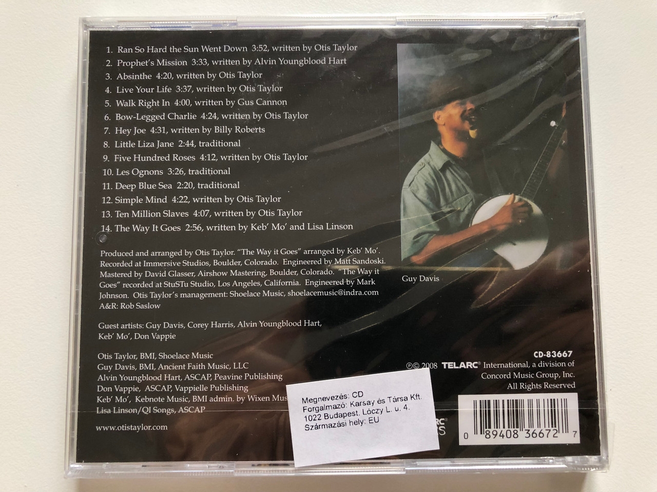 https://cdn10.bigcommerce.com/s-62bdpkt7pb/products/0/images/201280/Otis_Taylor_-_Recapturing_The_Banjo_-_Guy_Davis_Corey_Harris_Alvin_Youngblood_Hart_Keb_Mo_Otis_Taylor_Don_Vappie_Telarc_Audio_CD_2008_CD-83667_2__15548.1638979346.1280.1280.JPG?c=2&_gl=1*3ygiii*_ga*MjA2NTIxMjE2MC4xNTkwNTEyNTMy*_ga_WS2VZYPC6G*MTYzODk3MDI5OS4yMDYuMS4xNjM4OTc5MTI2LjQy