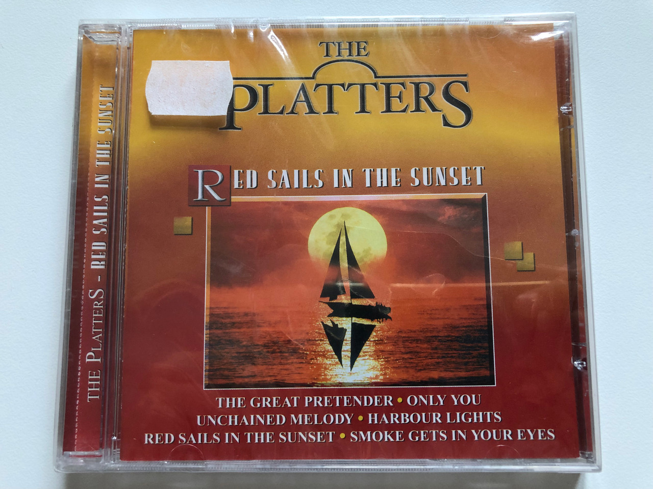 https://cdn10.bigcommerce.com/s-62bdpkt7pb/products/0/images/201320/The_Platters_Red_Sails_In_The_Sunset_The_Great_Pretender_Only_You_Unchained_Melody_Harbour_Lights_Red_Sails_In_The_Sunset_Smoke_Gets_In_Your_Eyes_Going_For_A_Song_Audio_CD_GFS_163_1__66756.1638986859.1280.1280.JPG?c=2&_gl=1*cwa7k8*_ga*MjA2NTIxMjE2MC4xNTkwNTEyNTMy*_ga_WS2VZYPC6G*MTYzODk3MDI5OS4yMDYuMS4xNjM4OTg2NzM0LjIz