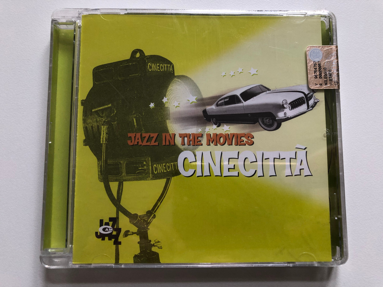 https://cdn10.bigcommerce.com/s-62bdpkt7pb/products/0/images/201602/Jazz_In_The_Movies_-_Cinecitt_C.A.M._Jazz_Audio_CD_2002_CAMJ_7751-2_1__29153.1639388682.1280.1280.JPG?c=2&_gl=1*1k0uwx7*_ga*MjA2NTIxMjE2MC4xNTkwNTEyNTMy*_ga_WS2VZYPC6G*MTYzOTM4NzU0Ny4yMTEuMC4xNjM5Mzg3NTQ3LjYw