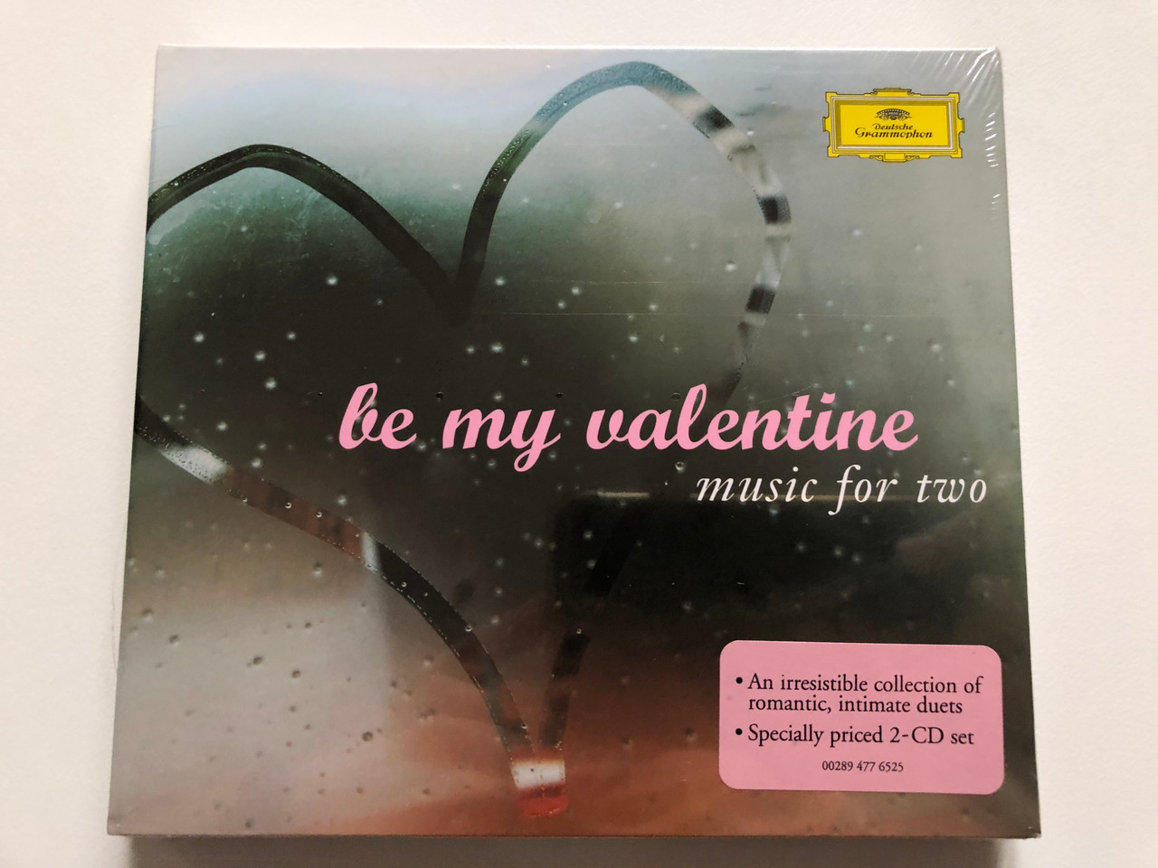 https://cdn10.bigcommerce.com/s-62bdpkt7pb/products/0/images/201617/Be_My_Valentine_Music_For_Two_An_irresistible_of_romantic_intimate_duets_Specially_priced_2-CD_set_Deutsche_Grammophon_2x_Audio_CD_2006_4776526_1__95686.1639392747.1280.1280.JPG?c=2&_gl=1*1pms3nh*_ga*MjA2NTIxMjE2MC4xNTkwNTEyNTMy*_ga_WS2VZYPC6G*MTYzOTM5MDc3NS4yMTIuMS4xNjM5MzkyNjE5LjEz