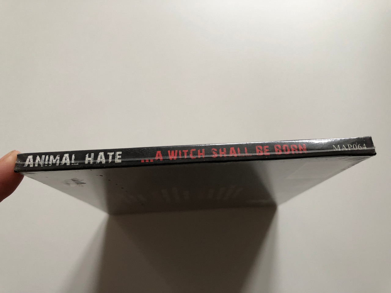 https://cdn10.bigcommerce.com/s-62bdpkt7pb/products/0/images/201619/Animal_Hate_...A_Witch_Shall_Be_Born_Metal_Age_Productions_Audio_CD_MAP064_3__09433.1639392994.1280.1280.JPG?c=2&_gl=1*15mn4wb*_ga*MjA2NTIxMjE2MC4xNTkwNTEyNTMy*_ga_WS2VZYPC6G*MTYzOTM5MDc3NS4yMTIuMS4xNjM5MzkyOTAyLjI3