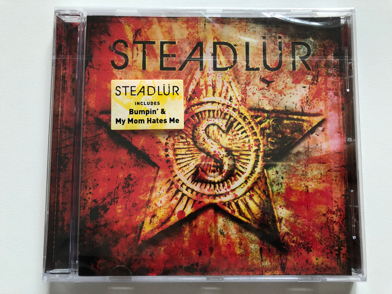 https://cdn10.bigcommerce.com/s-62bdpkt7pb/products/0/images/201660/Steadlr_Includes_Bumpin_My_Mom_Hates_Me_Roadrunner_Records_Audio_CD_2009_RR_8007-2_1__47699.1639405163.1280.1280.JPG?c=2&_gl=1*14nyz5v*_ga*MjA2NTIxMjE2MC4xNTkwNTEyNTMy*_ga_WS2VZYPC6G*MTYzOTQwMjM2NS4yMTQuMS4xNjM5NDA0OTk4LjU4