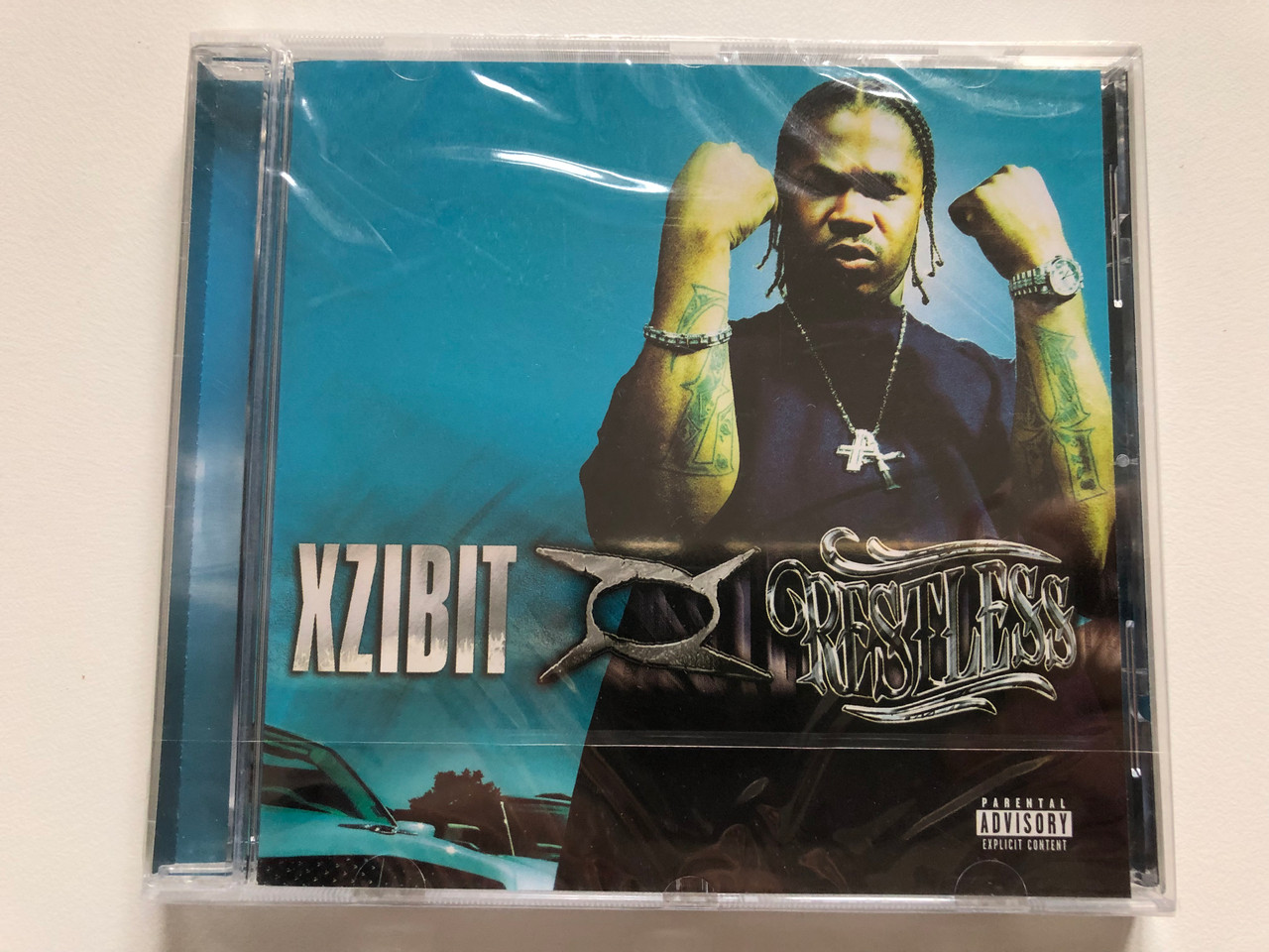 https://cdn10.bigcommerce.com/s-62bdpkt7pb/products/0/images/201722/Xzibit_Restless_Loud_Records_Audio_CD_2000_498913_2_1__29150.1639474430.1280.1280.JPG?c=2&_gl=1*1f7ozkl*_ga*MjA2NTIxMjE2MC4xNTkwNTEyNTMy*_ga_WS2VZYPC6G*MTYzOTQ2NTk0MC4yMTUuMS4xNjM5NDc0MTY2LjEx