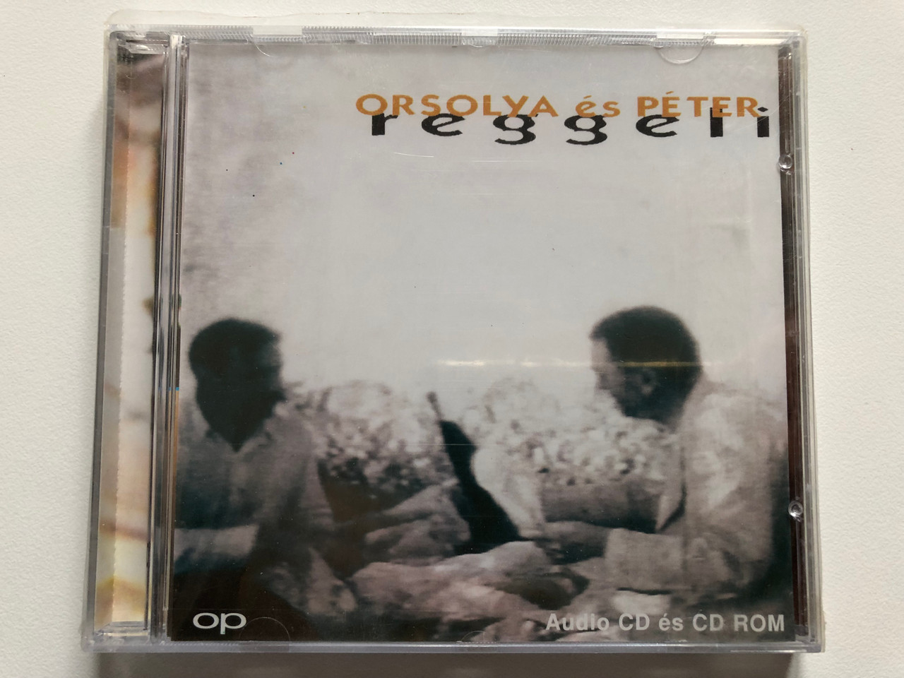 https://cdn10.bigcommerce.com/s-62bdpkt7pb/products/0/images/201790/Orsolya_s_Pter_Reggeli_Bahia_Music_Audio_CD_1997_CDB_032_1__42014.1639557076.1280.1280.JPG?c=2&_gl=1*1orfjgy*_ga*MjA2NTIxMjE2MC4xNTkwNTEyNTMy*_ga_WS2VZYPC6G*MTYzOTU1MjAyMC4yMTcuMS4xNjM5NTU2OTYxLjU4