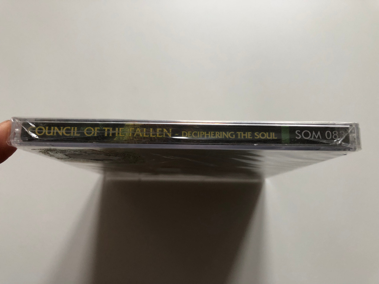 https://cdn10.bigcommerce.com/s-62bdpkt7pb/products/0/images/201800/Council_Of_The_Fallen_Deciphering_The_Soul_Featuring_Tim_Yeung_Ex_Hate_Eternal_and_produced_by_Eric_Rutan_Morbid_Angel_Season_Of_Mist_Audio_CD_2004_SOM_083_3__56456.1639560957.1280.1280.JPG?c=2&_gl=1*1y9wx50*_ga*MjA2NTIxMjE2MC4xNTkwNTEyNTMy*_ga_WS2VZYPC6G*MTYzOTU1MjAyMC4yMTcuMS4xNjM5NTYwMzUyLjU3