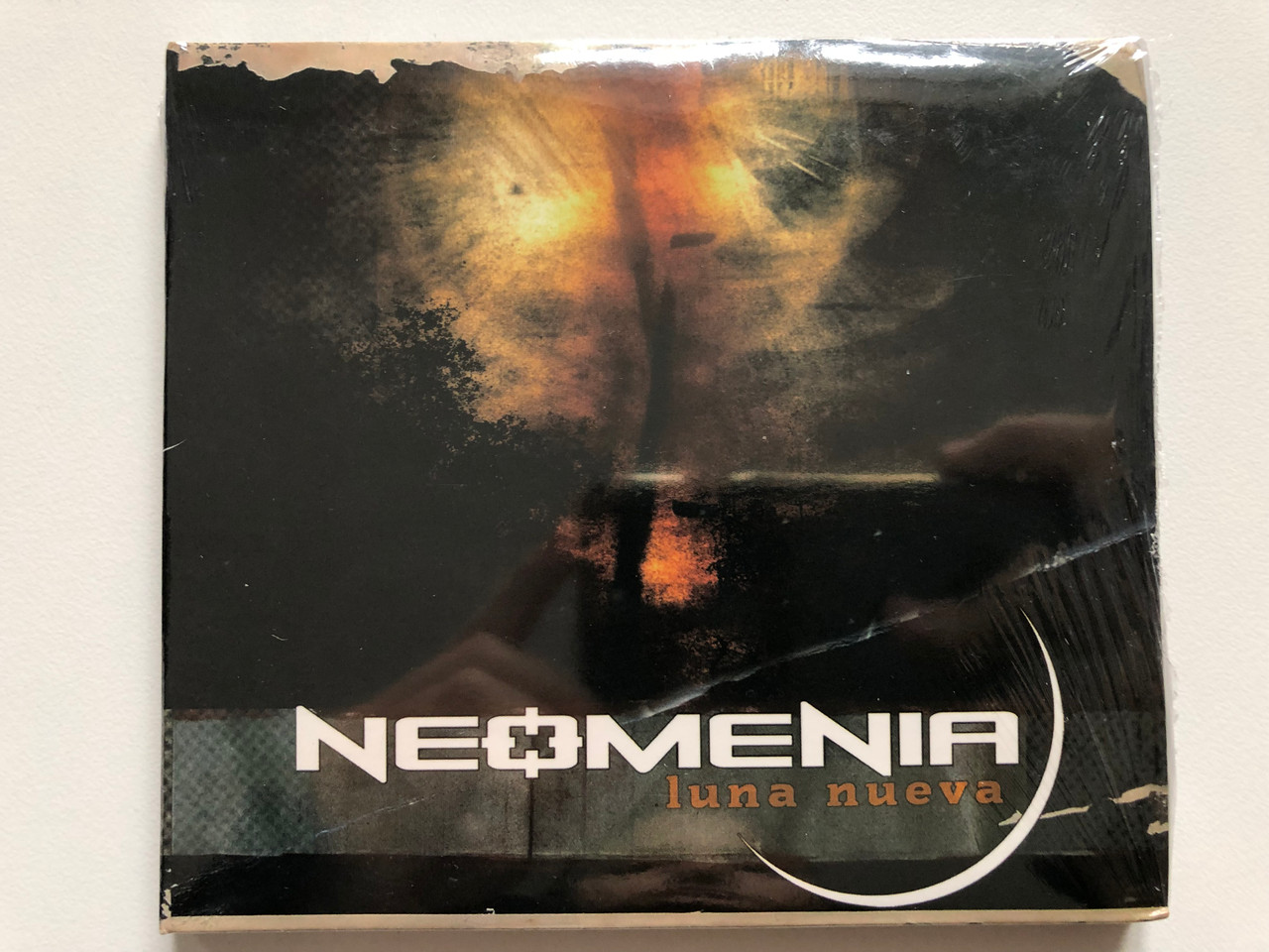 https://cdn10.bigcommerce.com/s-62bdpkt7pb/products/0/images/201810/Neomenia_Luna_Nueva_Locomotive_Records_Audio_CD_2007_LM414_1__11496.1639562511.1280.1280.JPG?c=2&_gl=1*sos8dk*_ga*MjA2NTIxMjE2MC4xNTkwNTEyNTMy*_ga_WS2VZYPC6G*MTYzOTU1MjAyMC4yMTcuMS4xNjM5NTYyNDQ0LjM2