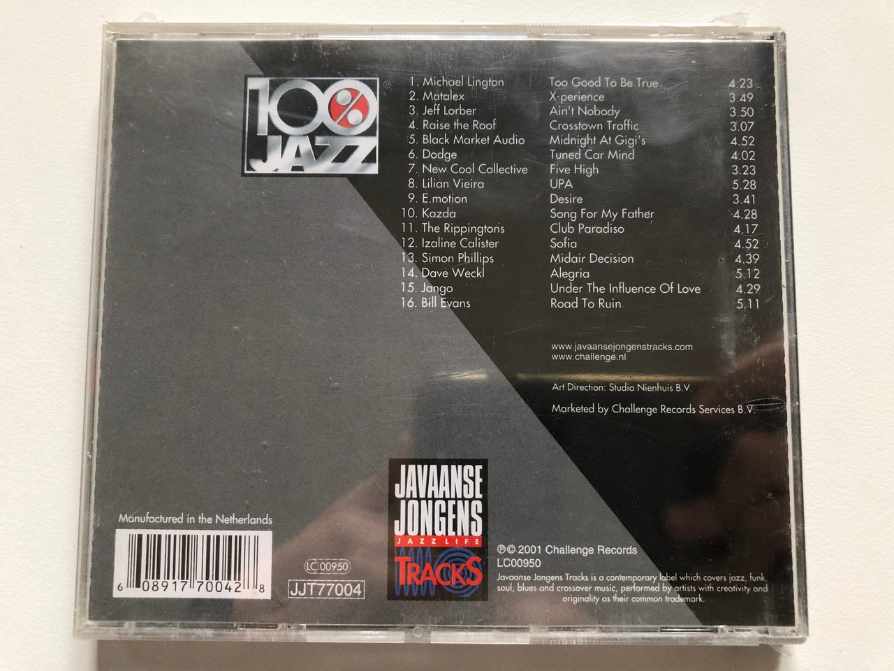 https://cdn10.bigcommerce.com/s-62bdpkt7pb/products/0/images/201847/100_Jazz_-_Volume_1_-_2001_Javaanse_Jongens_Tracks_Audio_CD_2001_JJT77004_2__10064.1639583177.1280.1280.JPG?c=2&_gl=1*1yk5o09*_ga*MjA2NTIxMjE2MC4xNTkwNTEyNTMy*_ga_WS2VZYPC6G*MTYzOTU4MDEwMS4yMTguMS4xNjM5NTgzMjEwLjYw