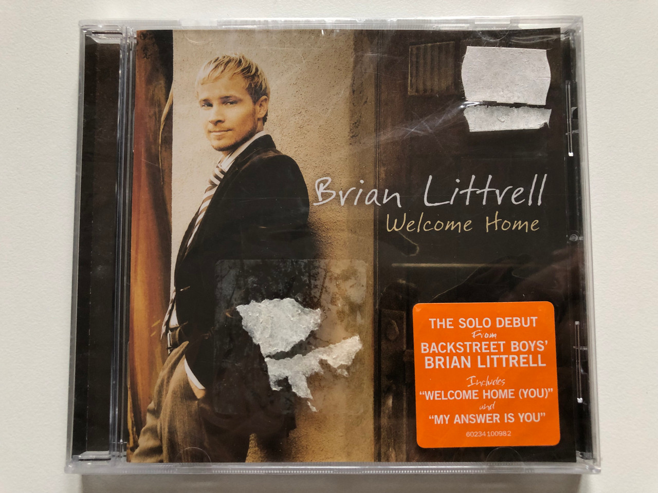 https://cdn10.bigcommerce.com/s-62bdpkt7pb/products/0/images/201876/Brian_Littrell_Welcome_Home_The_Solo_Debut_From_Backstreet_Boys_Brian_Littrell_Includes_Welcome_Home_You_and_My_Answer_Is_You_Reunion_Records_Audio_CD_2006_60234100982_1__73823.1639652278.1280.1280.JPG?c=2&_gl=1*4ttyb0*_ga*MjA2NTIxMjE2MC4xNTkwNTEyNTMy*_ga_WS2VZYPC6G*MTYzOTY0NjQ1OC4yMTkuMS4xNjM5NjUyMDc0LjUx