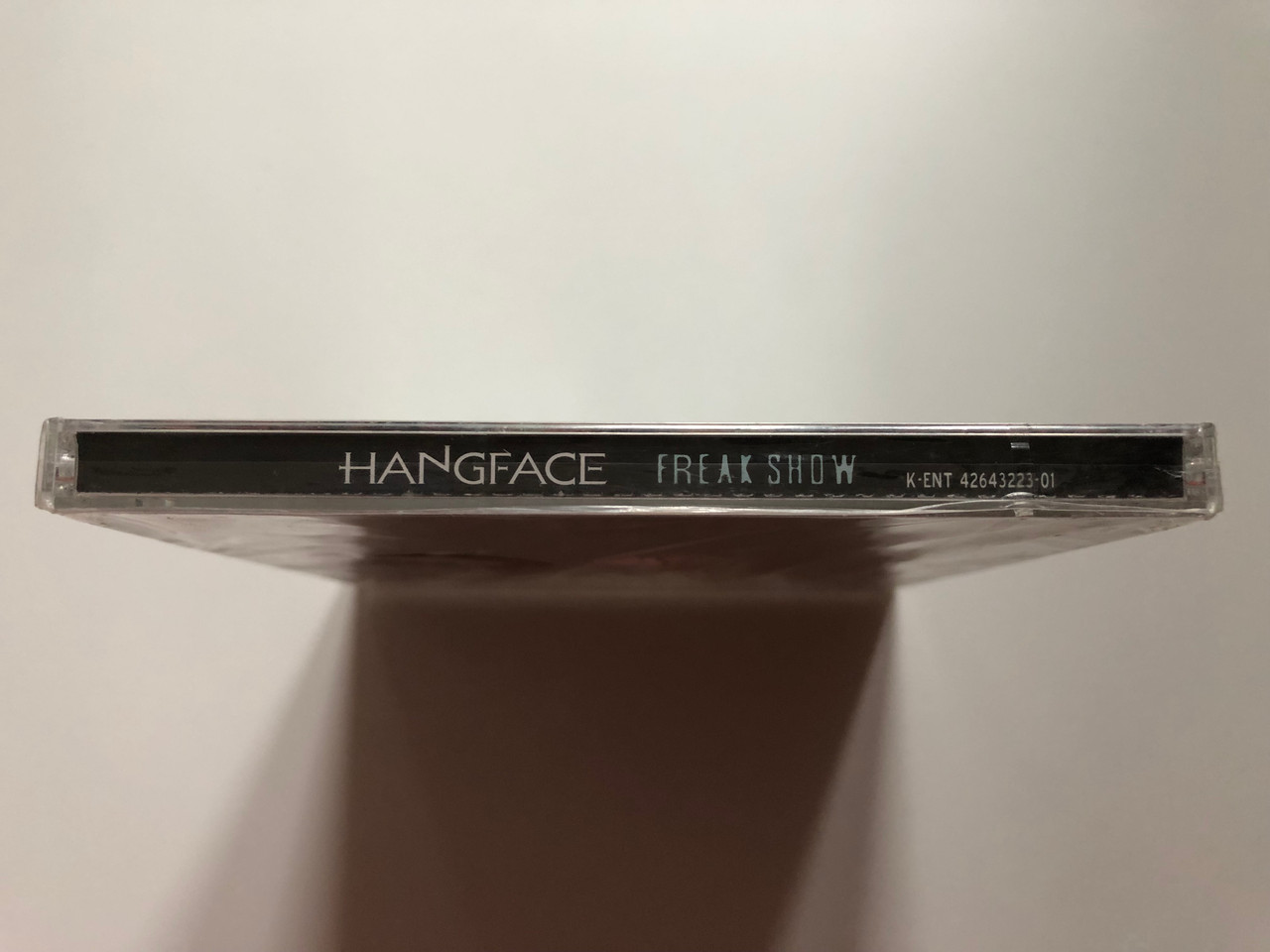 https://cdn10.bigcommerce.com/s-62bdpkt7pb/products/0/images/201953/Hangface_Freak_Show_K-Entertainment_Audio_CD_2005_K-ENT_42643223-01_3__25335.1639750934.1280.1280.JPG?c=2&_gl=1*rsydch*_ga*MjA2NTIxMjE2MC4xNTkwNTEyNTMy*_ga_WS2VZYPC6G*MTYzOTc0OTMxNS4yMjEuMS4xNjM5NzUwODM1LjE0