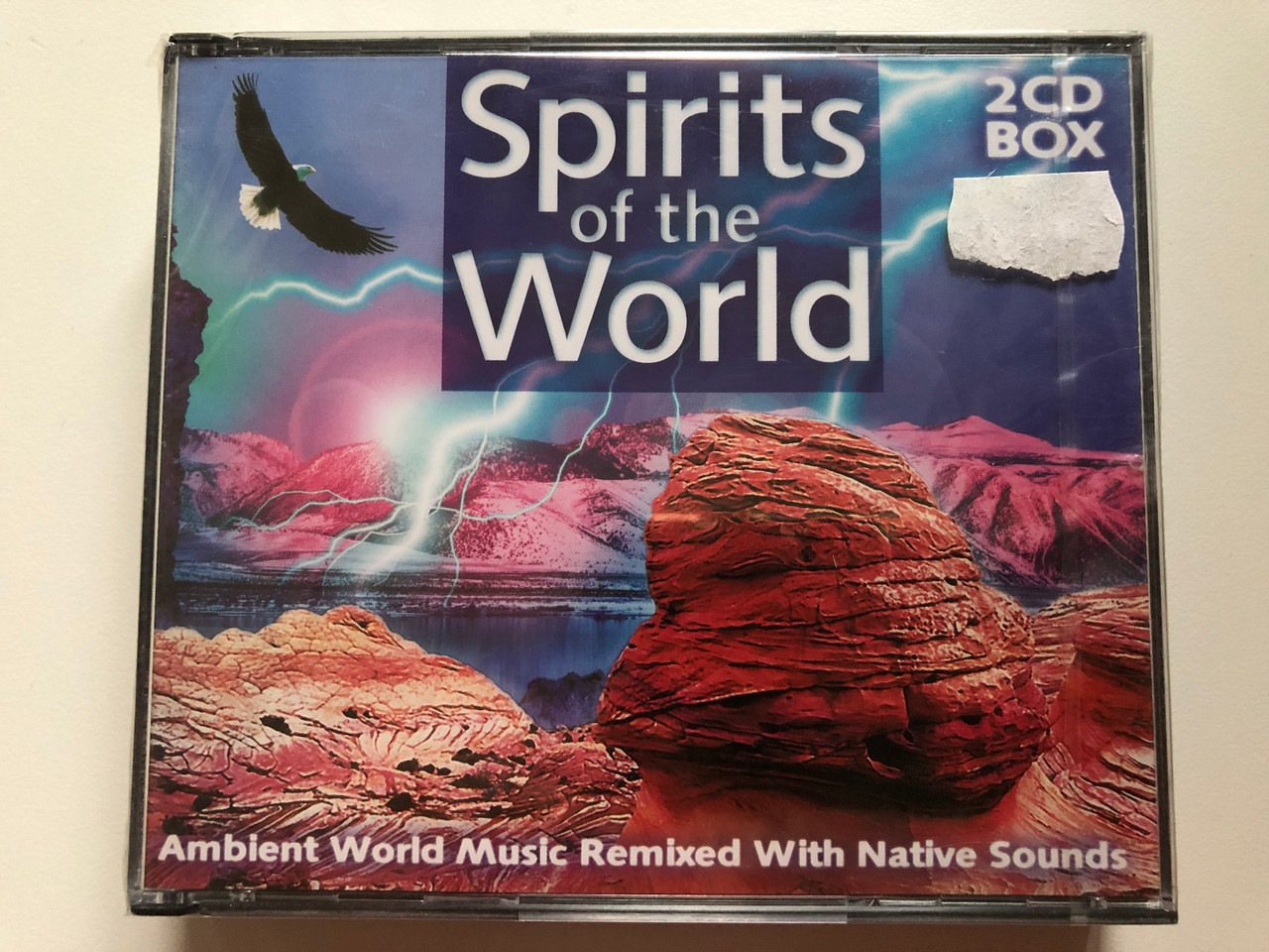 https://cdn10.bigcommerce.com/s-62bdpkt7pb/products/0/images/202173/Spirits_of_the_World_Ambient_World_Music_Remixed_With_Native_Sounds_2x_Audio_CD_6191_1__75217.1639983321.1280.1280.JPG?c=2&_gl=1*m2jufi*_ga*MjA2NTIxMjE2MC4xNTkwNTEyNTMy*_ga_WS2VZYPC6G*MTYzOTk4MjAwOC4yMjMuMS4xNjM5OTgzMTE0LjU3