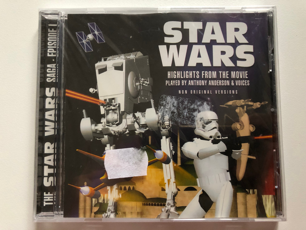 https://cdn10.bigcommerce.com/s-62bdpkt7pb/products/0/images/202179/The_Star_Wars_Saga_-_Episode_I_-_Highlights_From_The_Movie_-_Played_by_Anthony_Anderson_Voices_Non_Original_Versions_Eurotrend_Audio_CD_152_1__94927.1639984701.1280.1280.JPG?c=2&_gl=1*1we6grg*_ga*MjA2NTIxMjE2MC4xNTkwNTEyNTMy*_ga_WS2VZYPC6G*MTYzOTk4MjAwOC4yMjMuMS4xNjM5OTg0NTAxLjI4