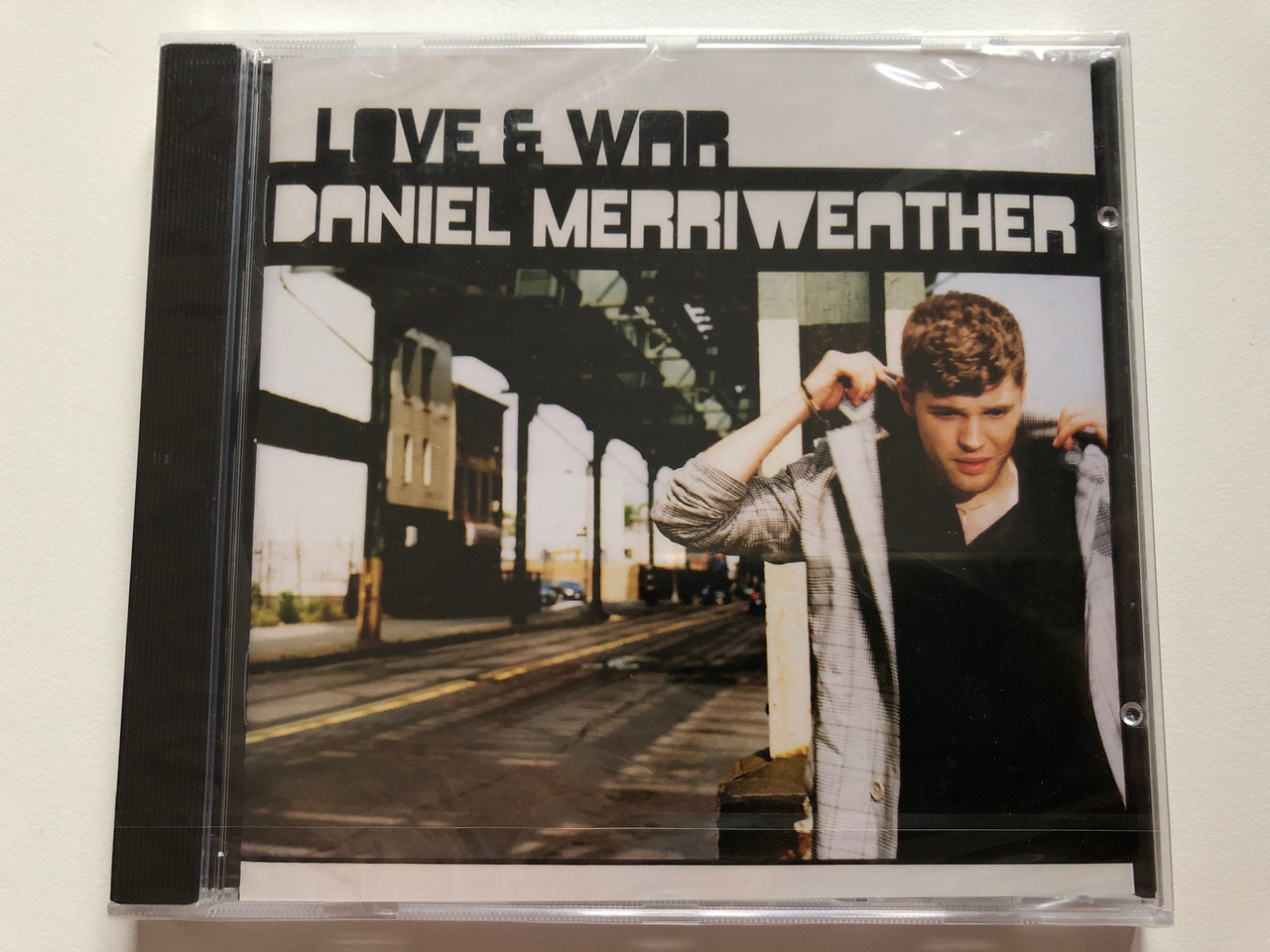 https://cdn10.bigcommerce.com/s-62bdpkt7pb/products/0/images/202194/Love_War_-_Daniel_Merriweather_J_Records_Audio_CD_2009_88697473192_1__24352.1639987206.1280.1280.JPG?c=2&_gl=1*1jjmtwu*_ga*MjA2NTIxMjE2MC4xNTkwNTEyNTMy*_ga_WS2VZYPC6G*MTYzOTk4MjAwOC4yMjMuMS4xNjM5OTg2NzA4LjI4