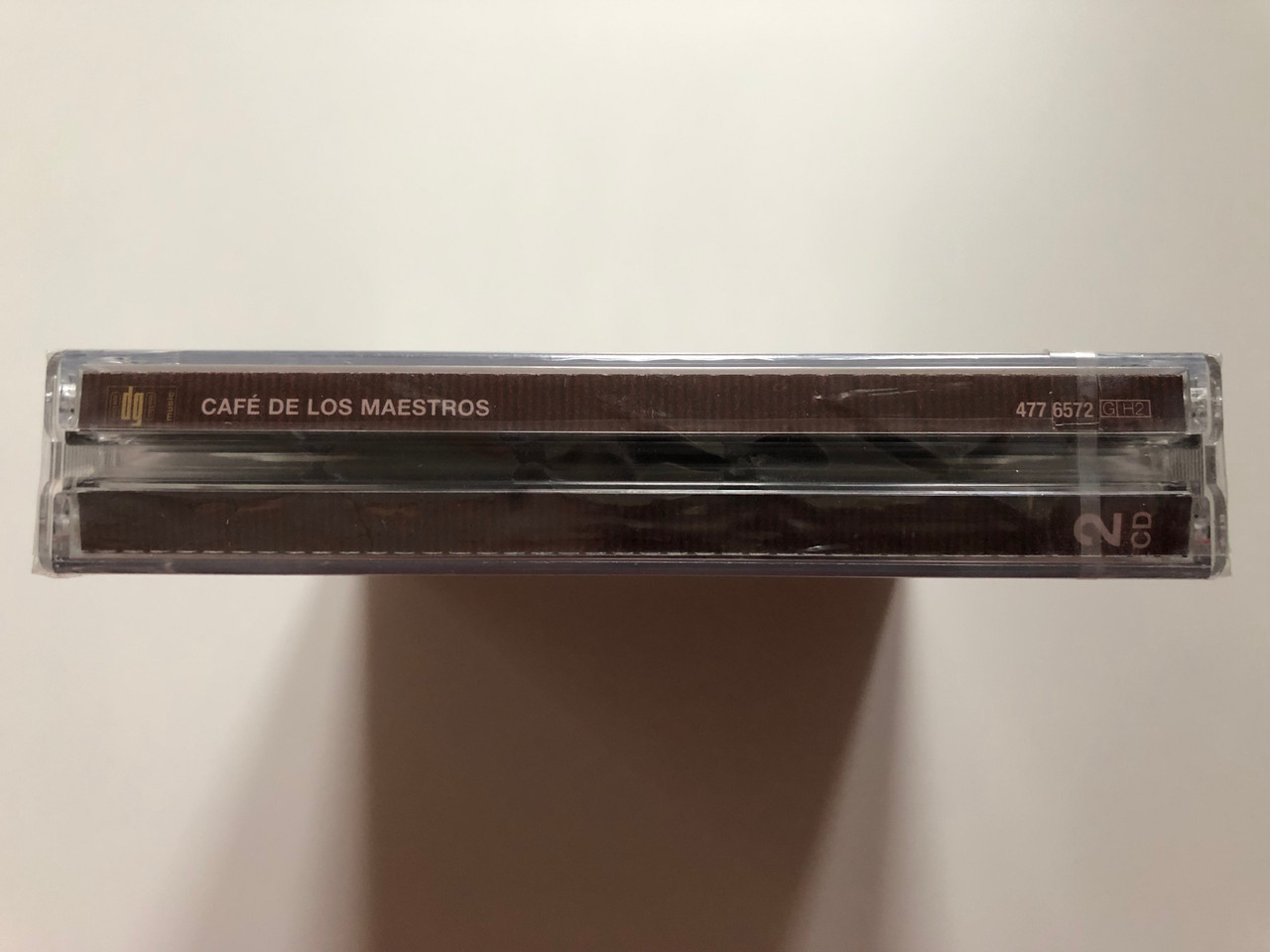 https://cdn10.bigcommerce.com/s-62bdpkt7pb/products/0/images/202196/Caf_De_Los_Maestros_Specially_Priced_2CD-Set_-_First_intertional_release._Deutsche_Grammophon_2x_Audio_CD_2008_4776572_3__15277.1639987530.1280.1280.JPG?c=2&_gl=1*1sfp6zz*_ga*MjA2NTIxMjE2MC4xNTkwNTEyNTMy*_ga_WS2VZYPC6G*MTYzOTk4MjAwOC4yMjMuMS4xNjM5OTg3Mzg1LjM4