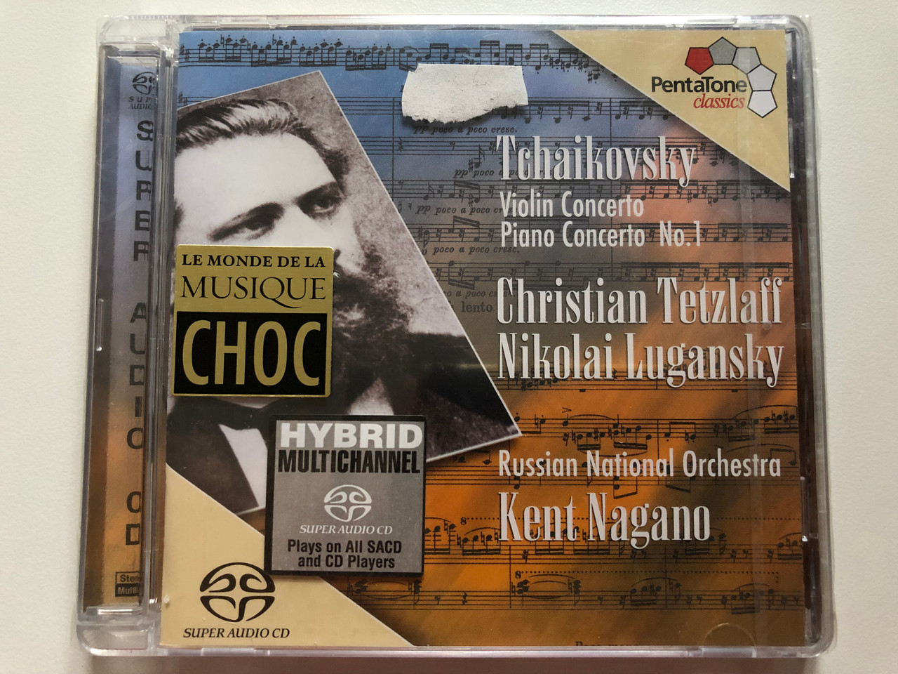 https://cdn10.bigcommerce.com/s-62bdpkt7pb/products/0/images/202215/Tchaikovsky_Violin_Concerto_Piano_Concerto_No._1_Christian_Tetzlaff_Nikolai_Lugansky_Russian_National_Orchestra_Kent_Nagano_PentaTone_classics_Audio_CD_2003_Stereo_PTC_5186_022_1__70049.1639989867.1280.1280.JPG?c=2&_gl=1*fi8q5q*_ga*MjA2NTIxMjE2MC4xNTkwNTEyNTMy*_ga_WS2VZYPC6G*MTYzOTk4MjAwOC4yMjMuMS4xNjM5OTg5NzEwLjc.