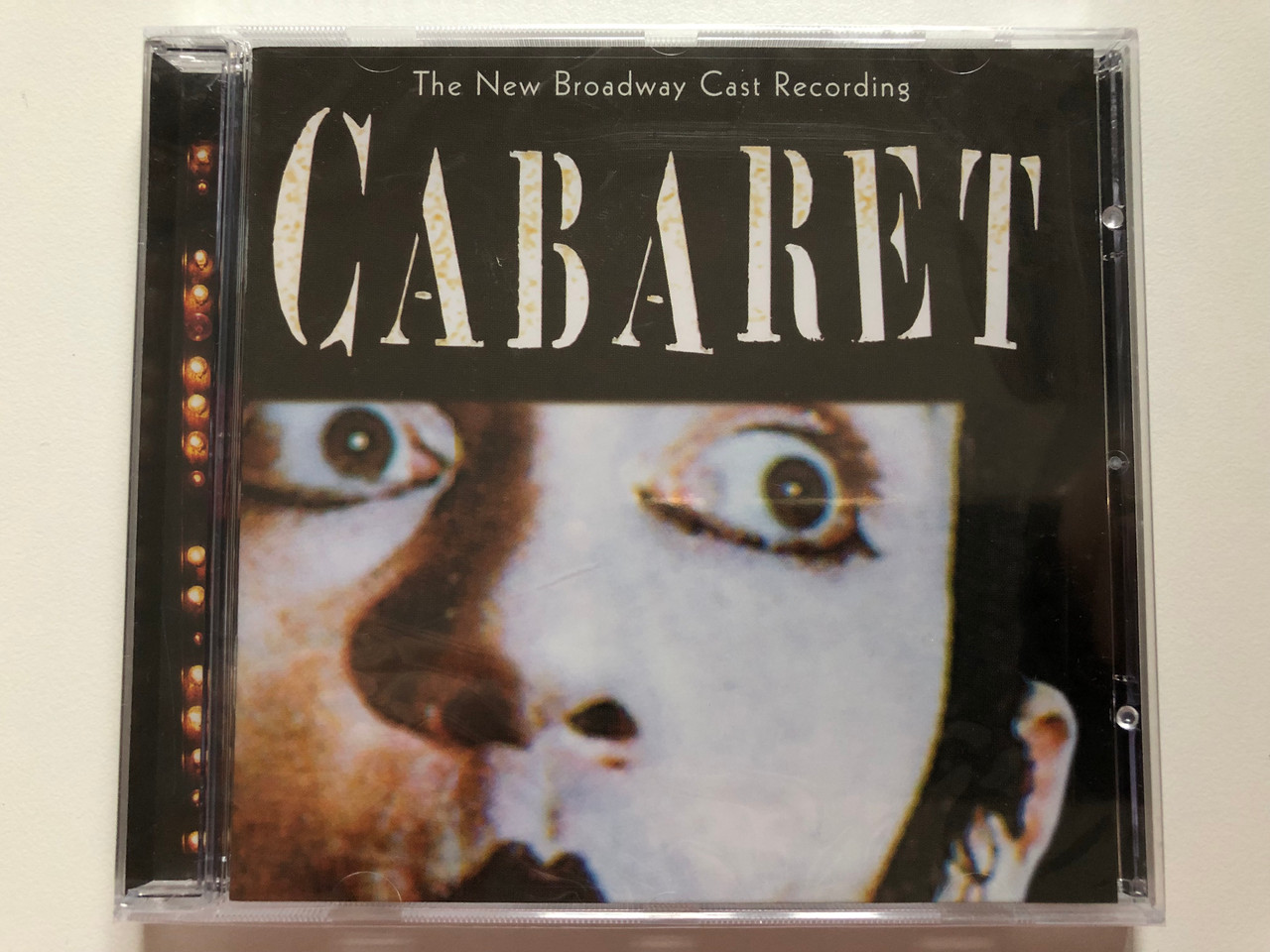 https://cdn10.bigcommerce.com/s-62bdpkt7pb/products/0/images/202221/Cabaret_The_New_Broadway_Cast_Recording_BMG_Classics_Audio_CD_1998_09026_63173_2_1__74253.1639991739.1280.1280.JPG?c=2&_gl=1*5dzfx9*_ga*MjA2NTIxMjE2MC4xNTkwNTEyNTMy*_ga_WS2VZYPC6G*MTYzOTk4MjAwOC4yMjMuMS4xNjM5OTkxNTk5LjU3