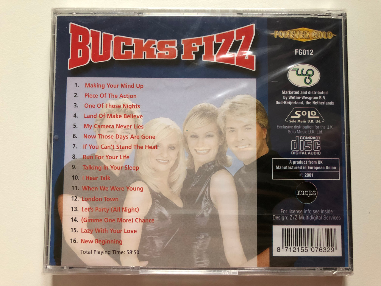https://cdn10.bigcommerce.com/s-62bdpkt7pb/products/0/images/202311/Bucks_Fizz_-_Making_Your_Mind_Up_Piece_Of_The_Action_Land_Of_Make_Believe_My_Camera_Never_Lies_Forever_Gold_Audio_CD_2001_FG012_2__04766.1640003727.1280.1280.JPG?c=2&_gl=1*syngmj*_ga*MjA2NTIxMjE2MC4xNTkwNTEyNTMy*_ga_WS2VZYPC6G*MTY0MDAwMjY5NC4yMjQuMS4xNjQwMDAzNTkxLjU2